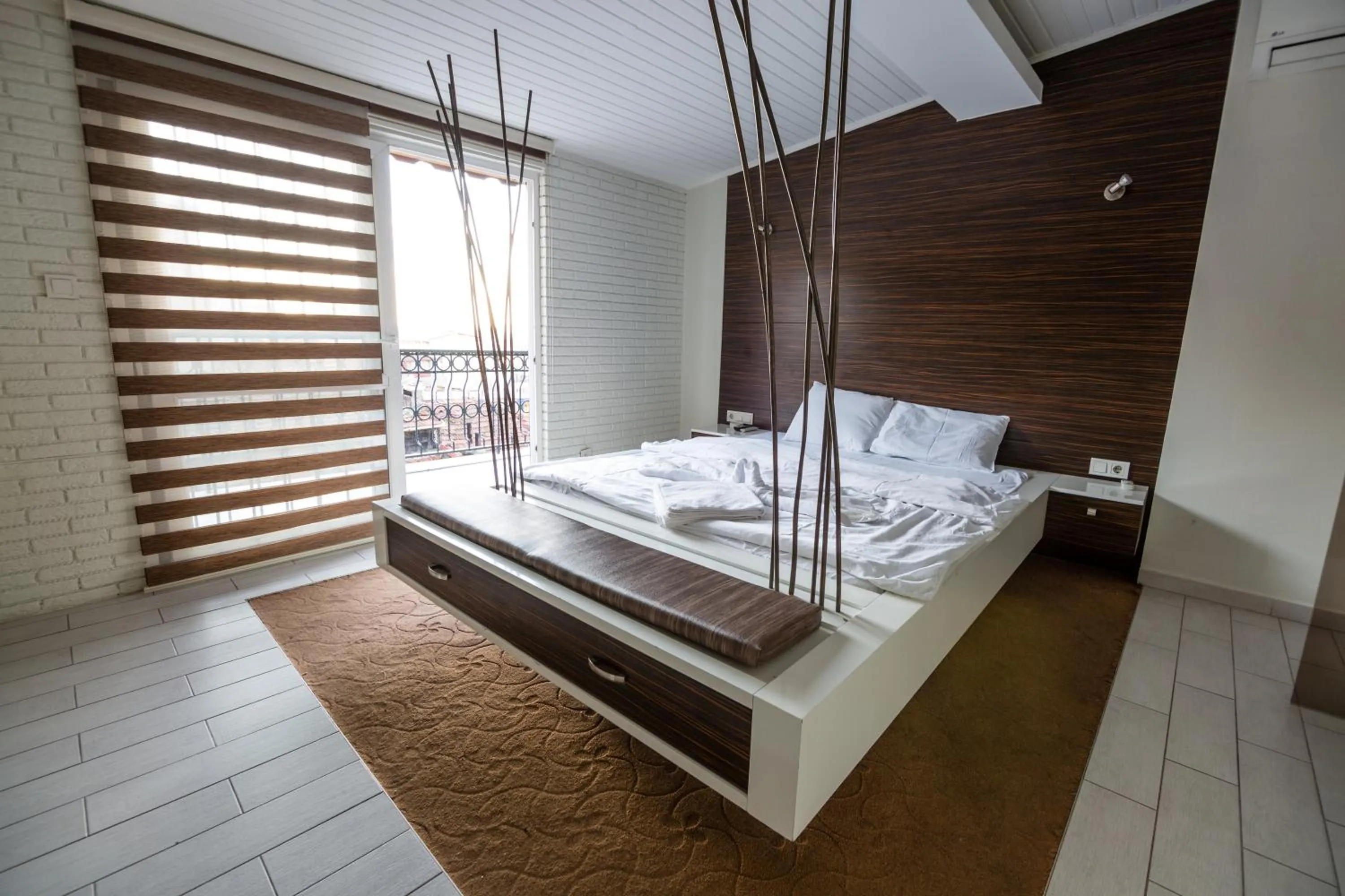 Photo of the whole room, Bed in Element Suites