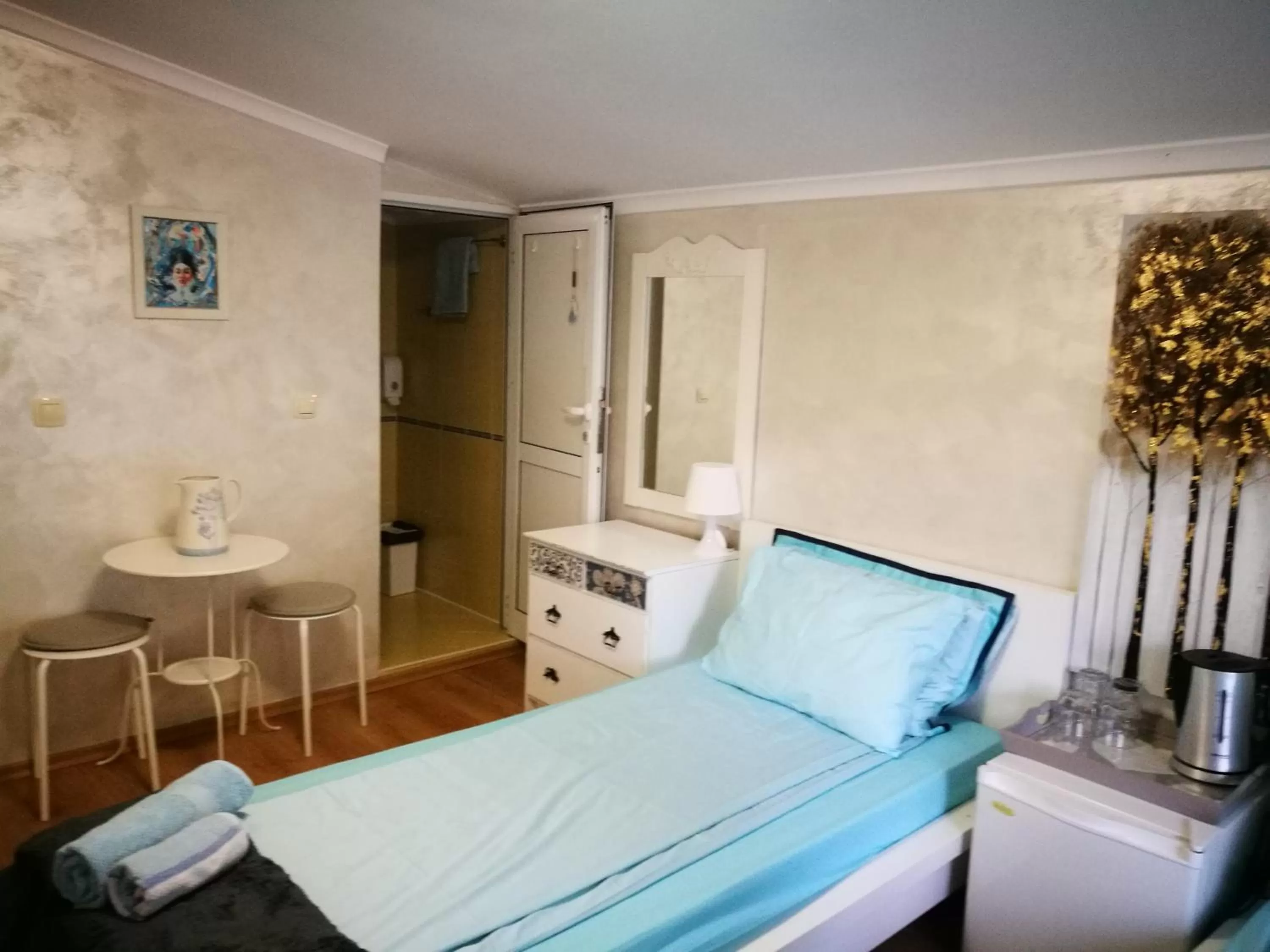 Bed in Hotel Paradise