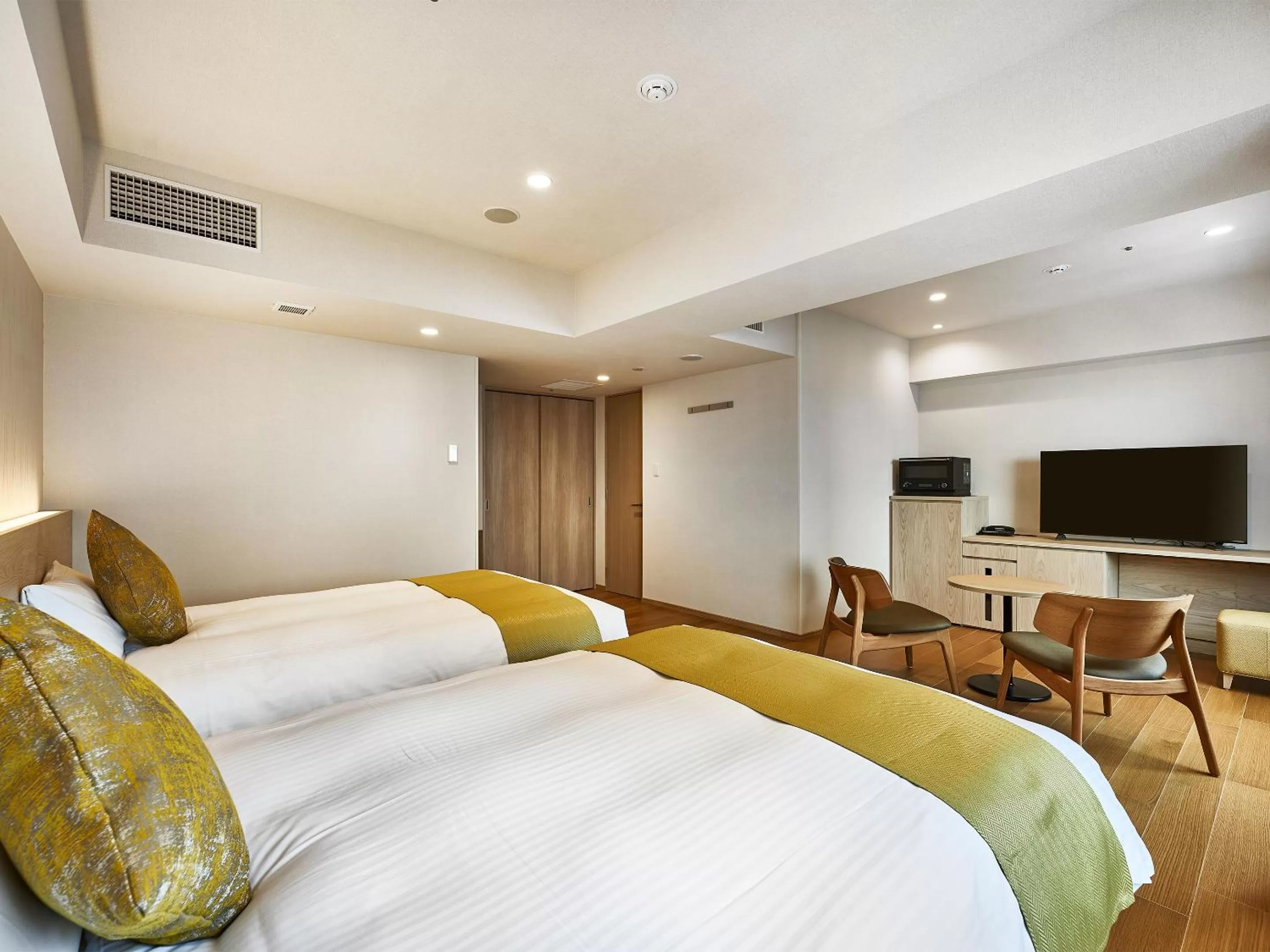 Bed in DEL style Osaka-Shinsaibashi by Daiwa Roynet Hotel