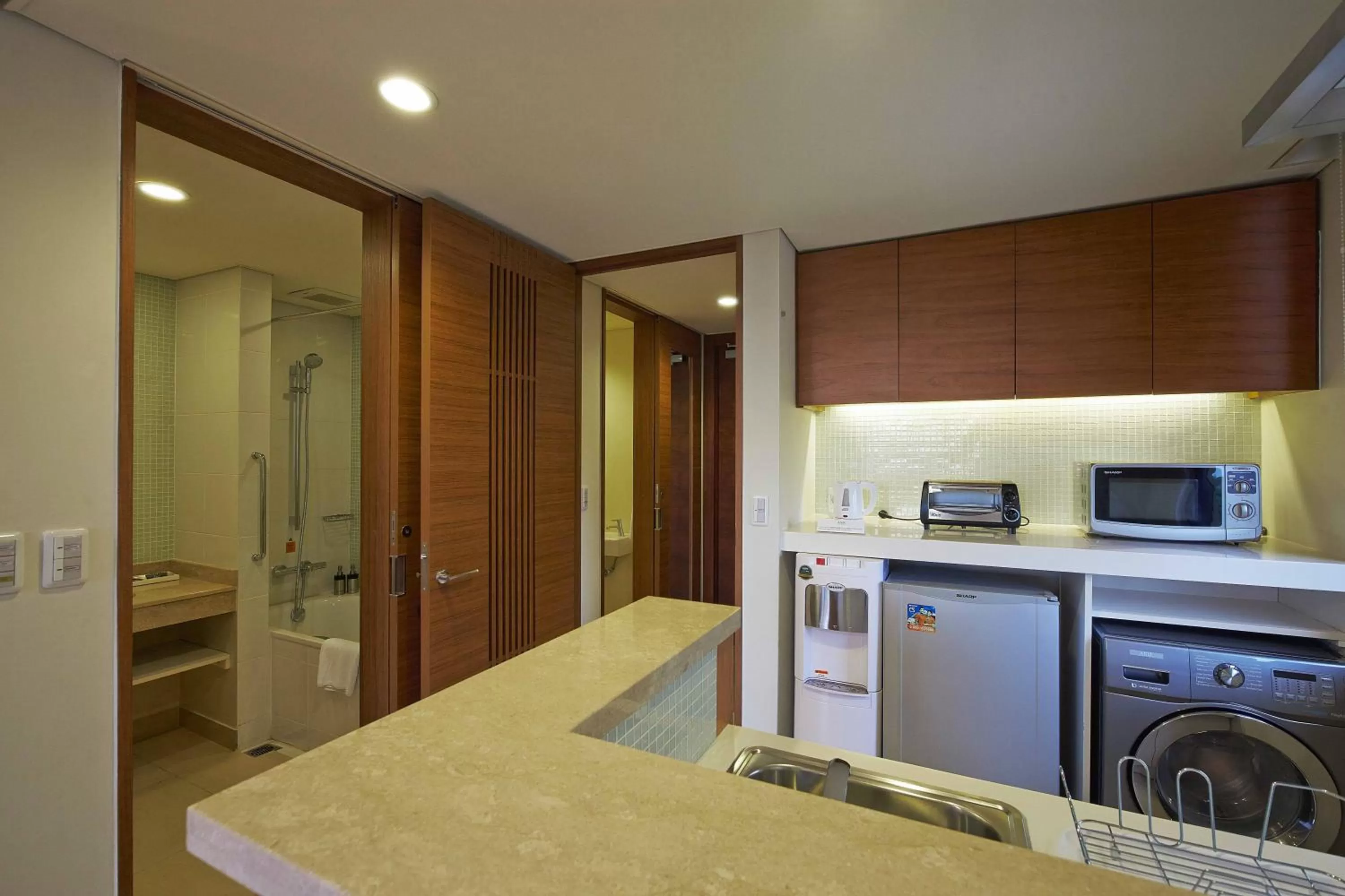 Kitchen or kitchenette in Axia South Cikarang Service Apartment