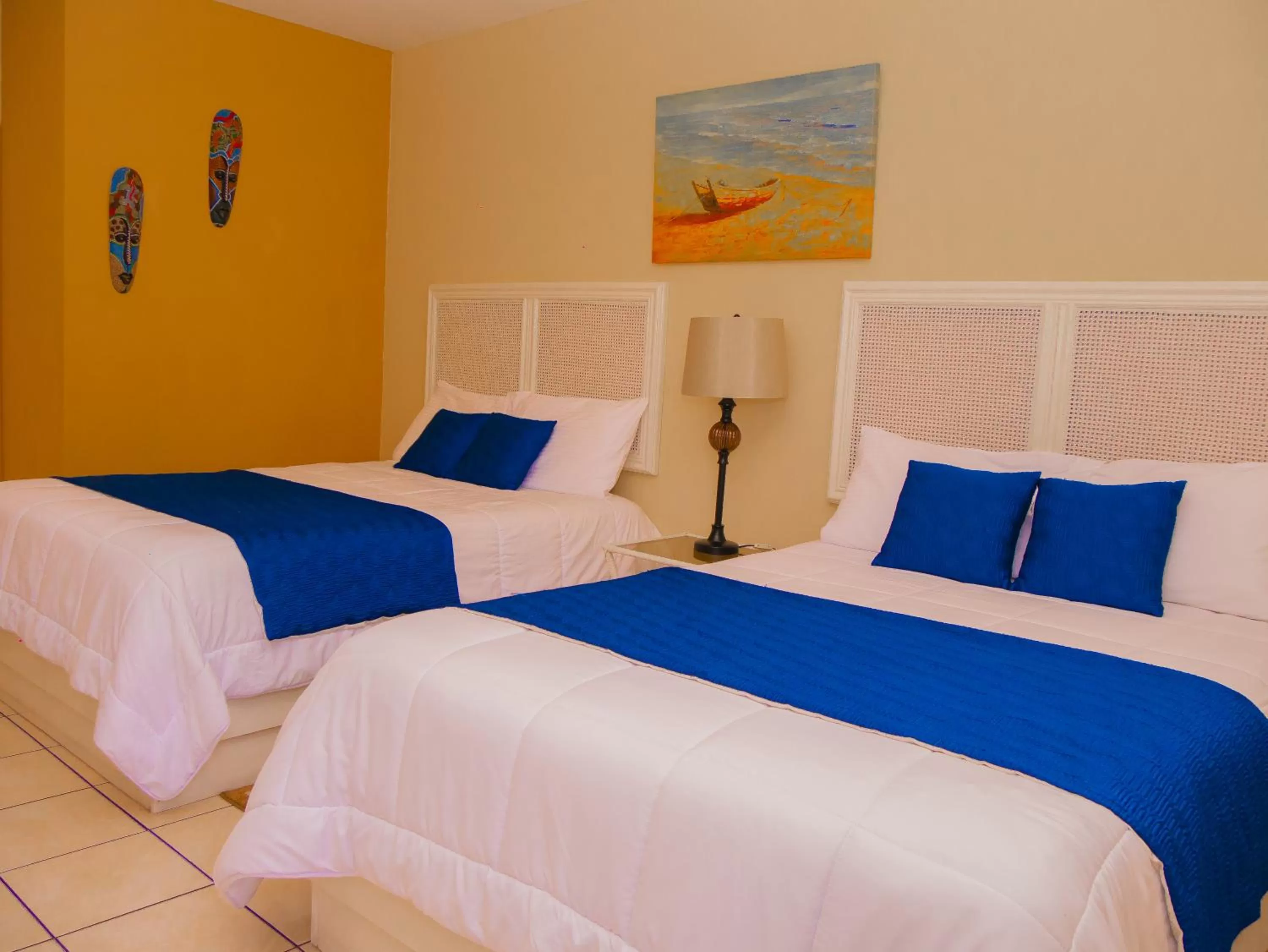 Bed in Hotel Bamboo Aeropuerto