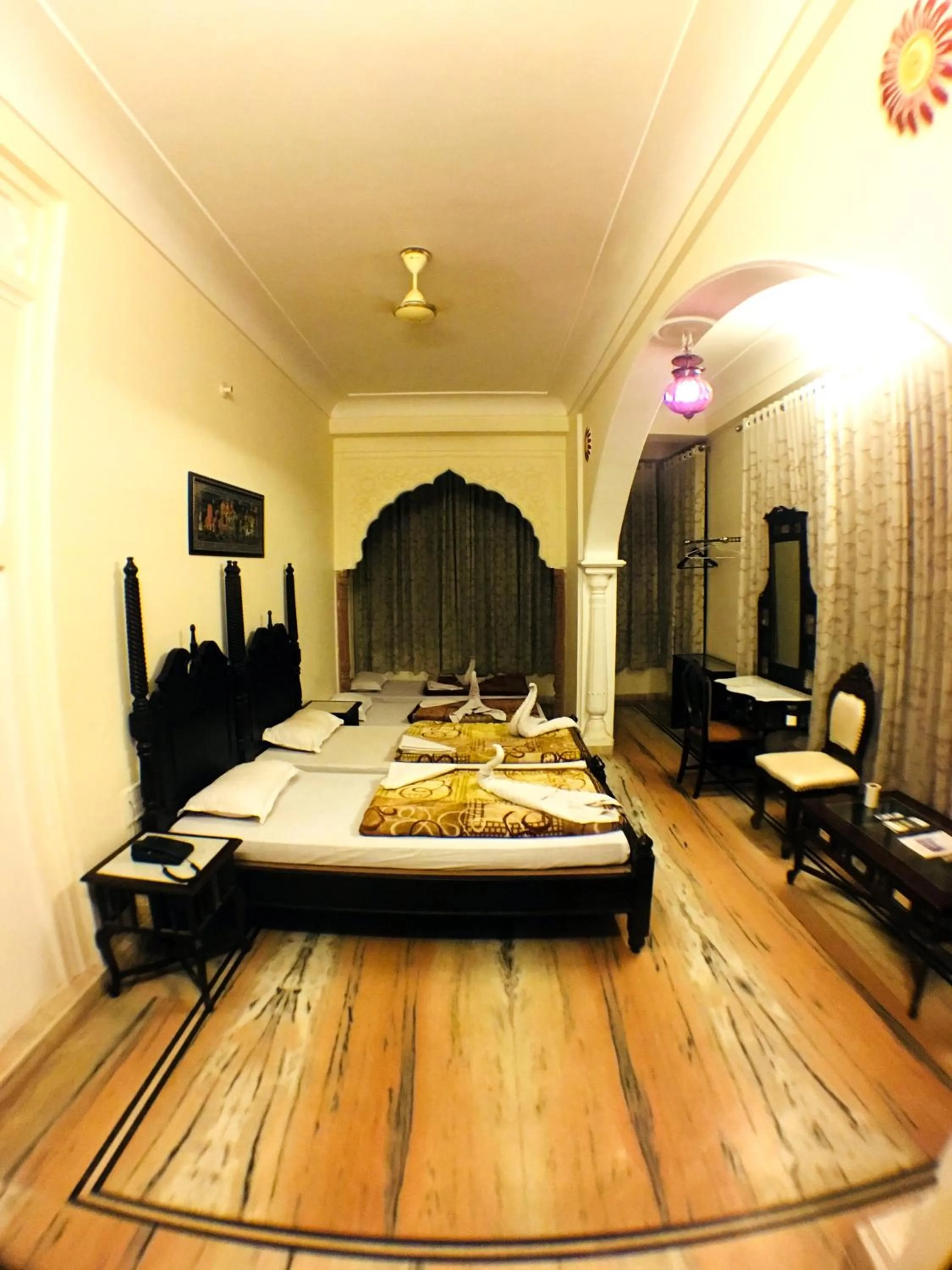 Bed in Krishna Palace - A Heritage Boutique Hotel
