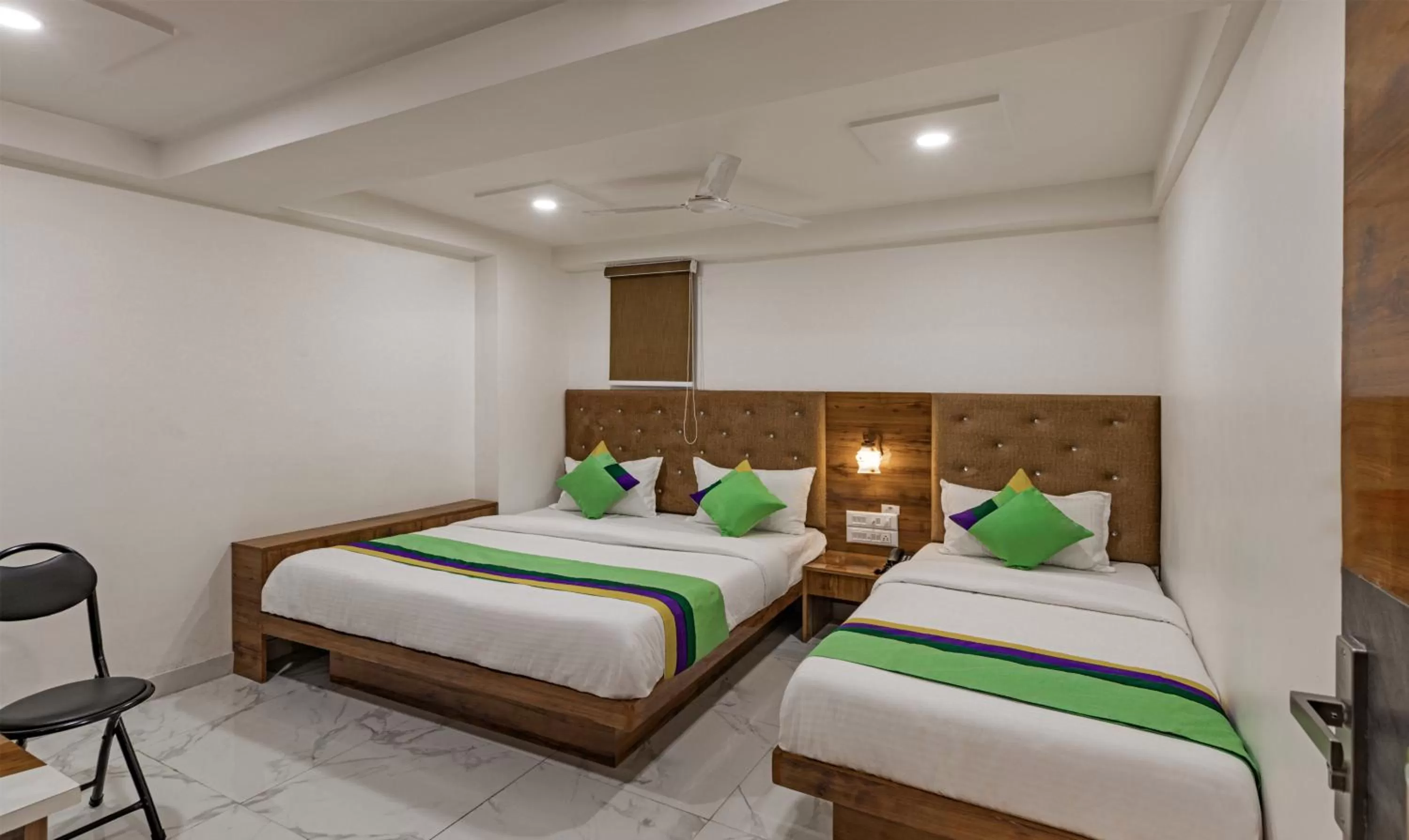 Bedroom, Bed in Treebo Prince Plaza