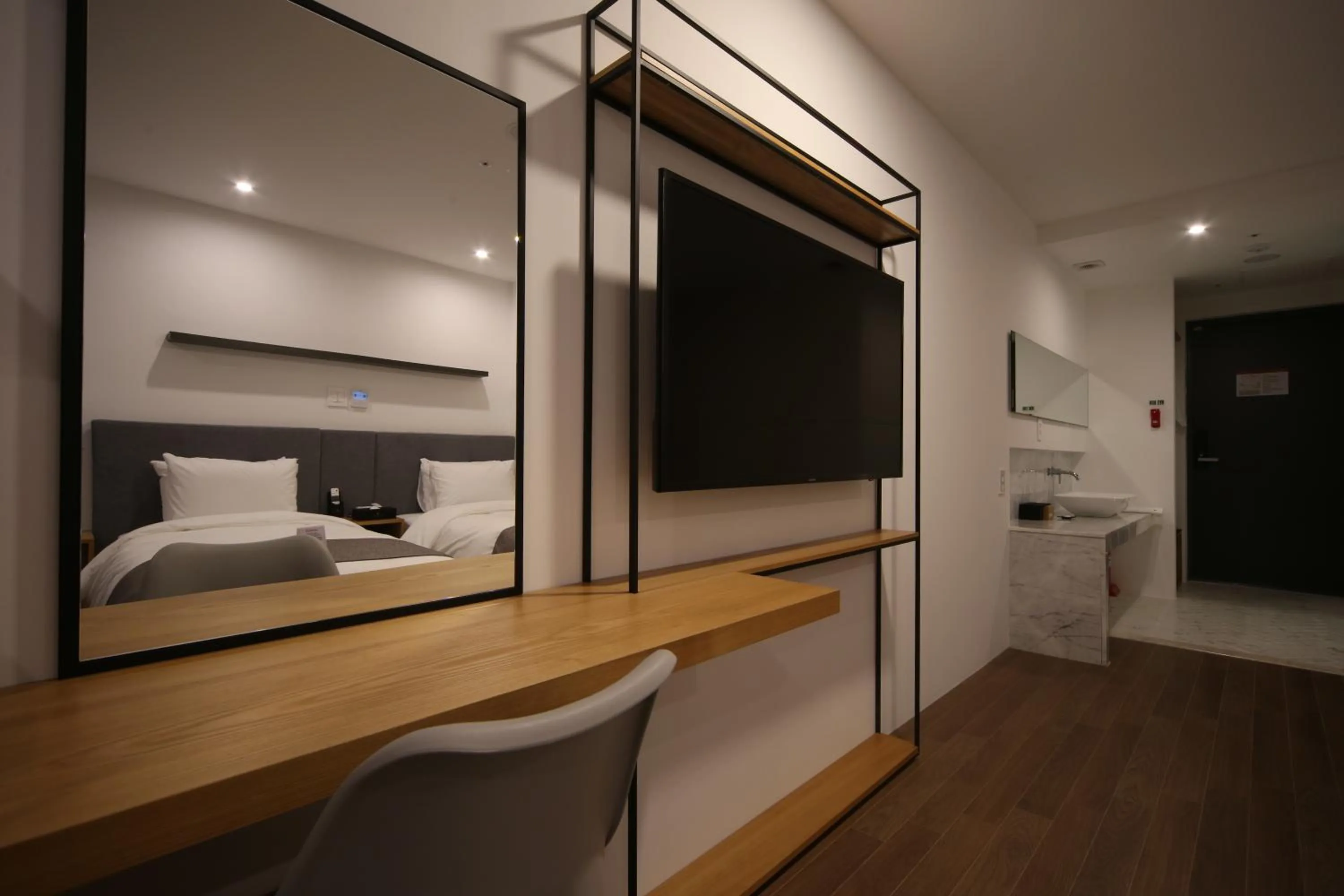 Bed in Hotel Noblestay