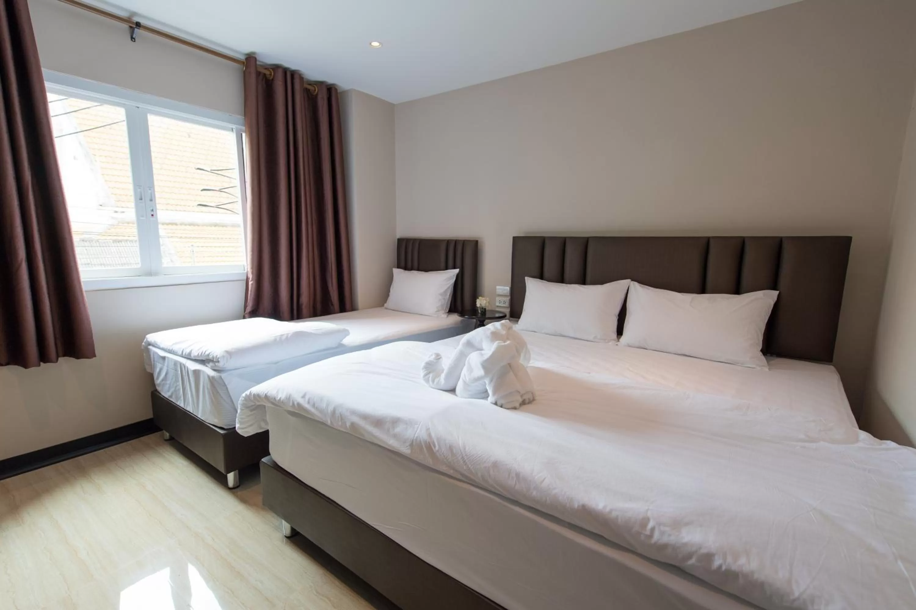 Bed in Let's Zzz Bangkok