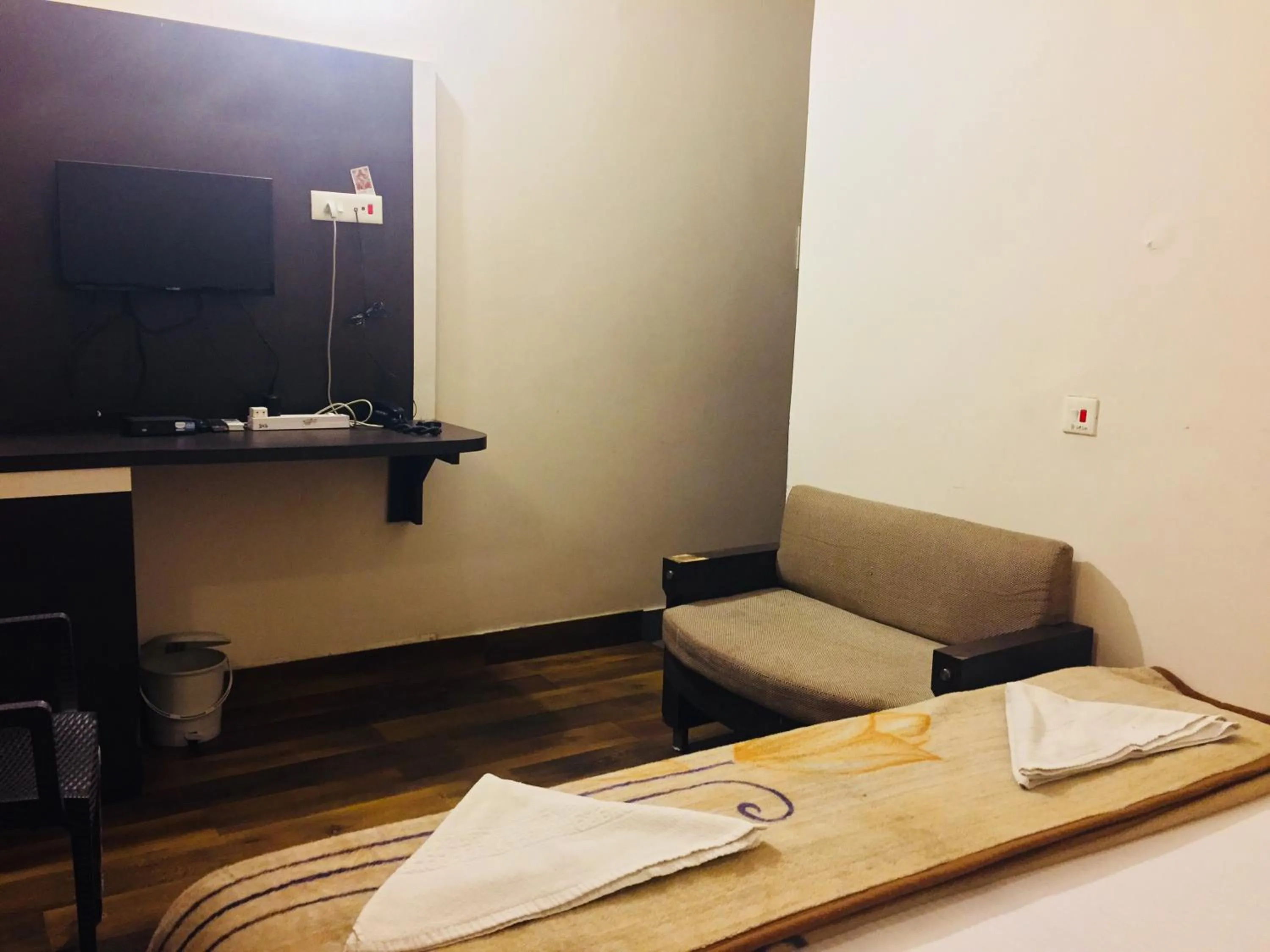 Photo of the whole room, TV/Entertainment Center in Hotel Sita (place on the heritage ghats of benaras)