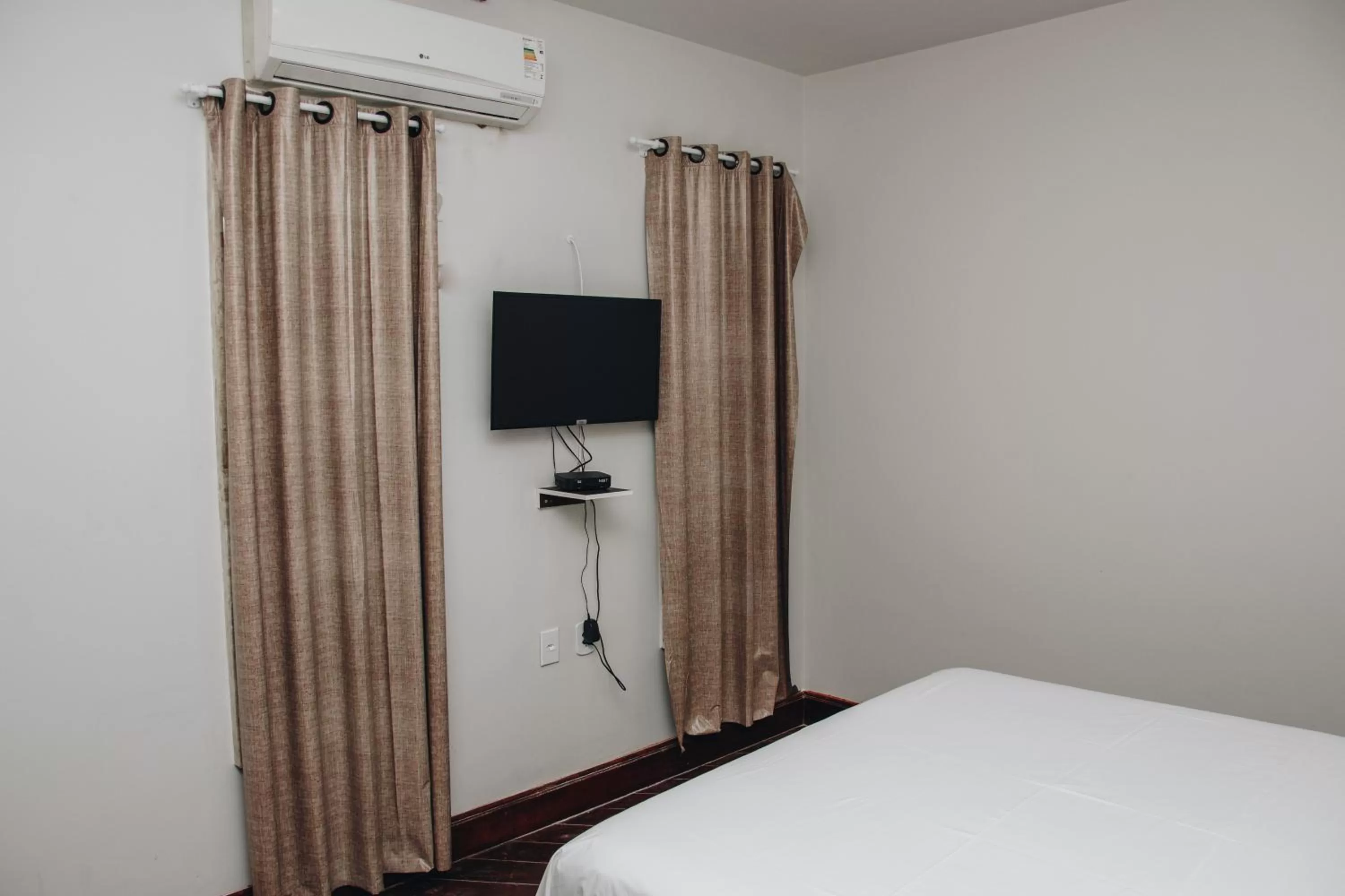 Bed in SAMIR HOTEL COMFORT