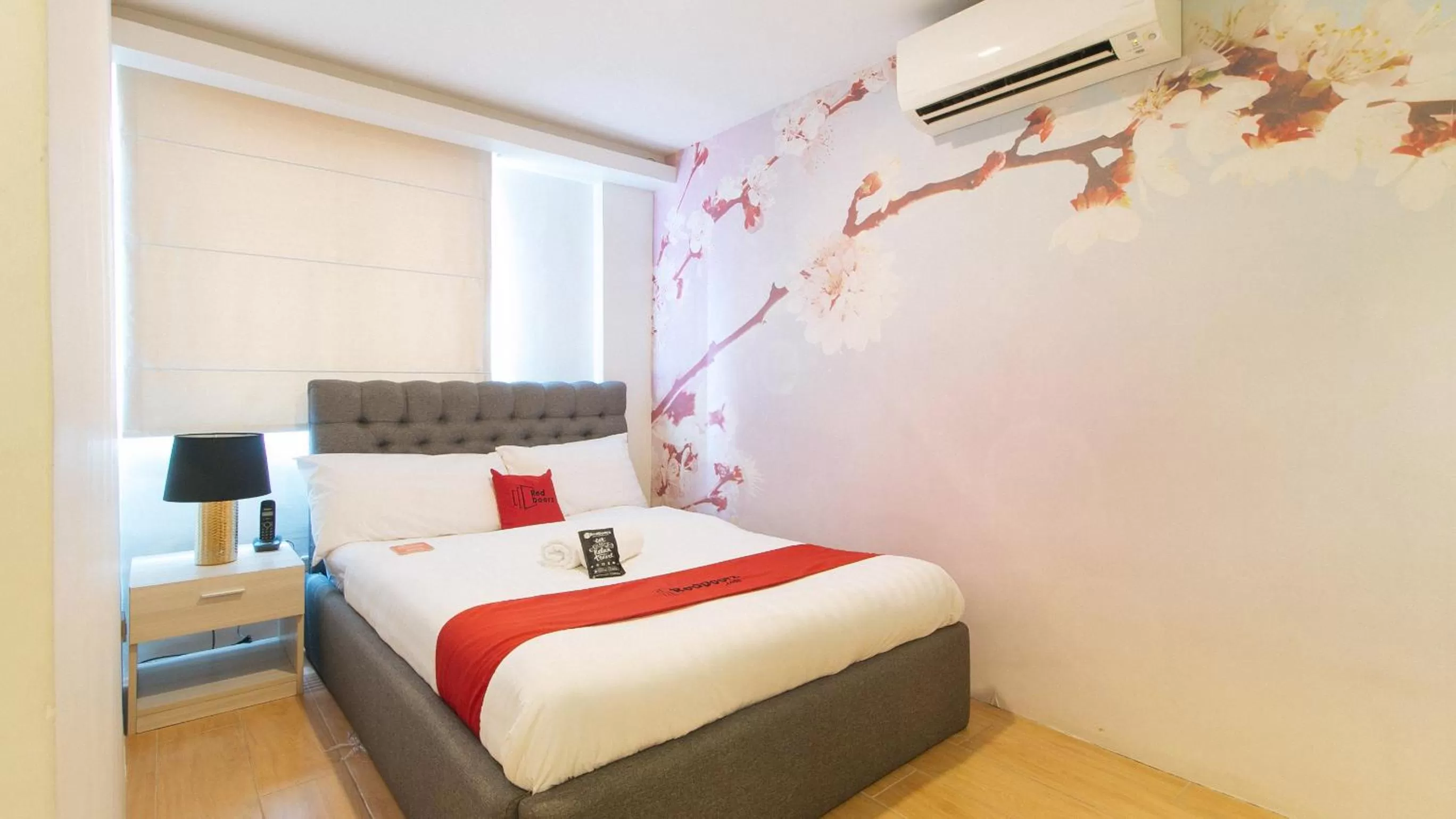 Bedroom, Bed in RedDoorz Plus at La Belle Residences Makati City