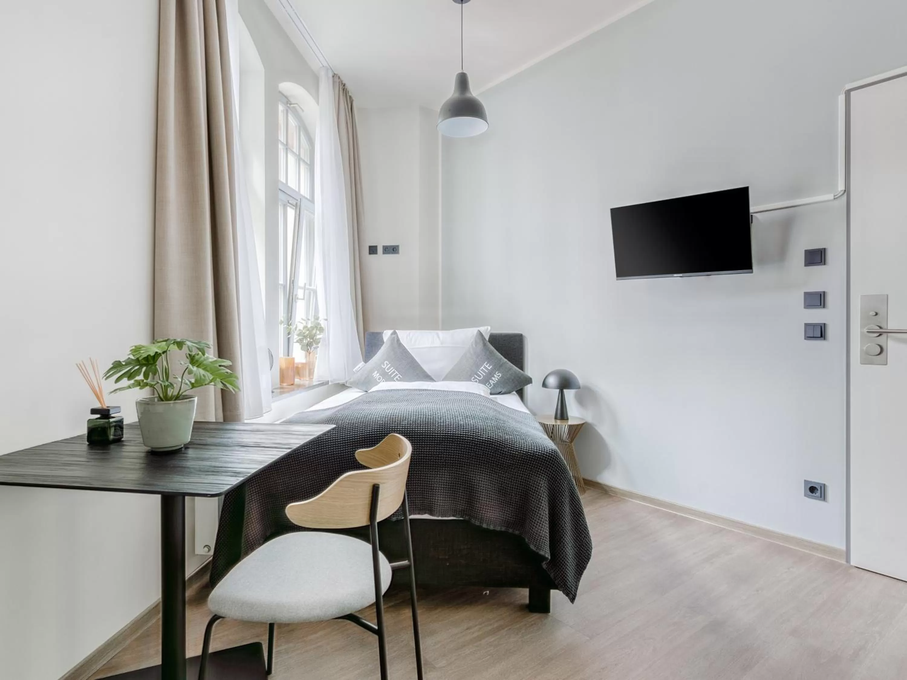 Bed in Limehome Leipzig Oelßner's Hof