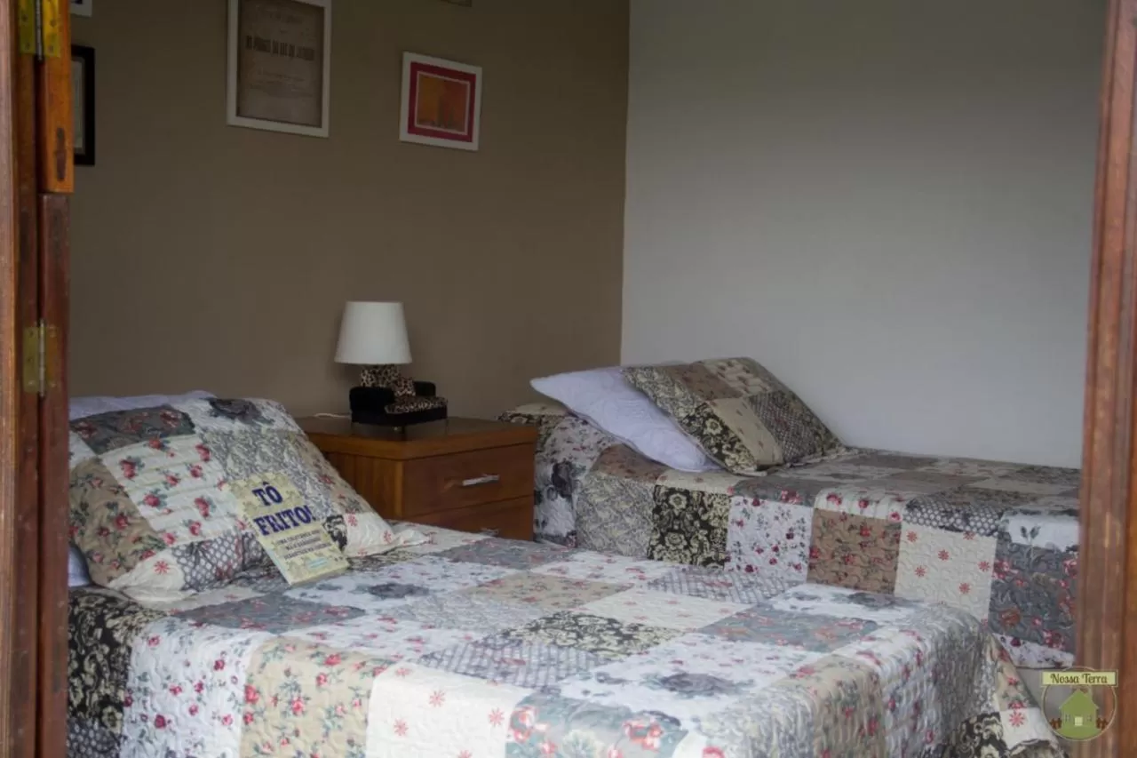 Bed in Pousada Nossa Terra