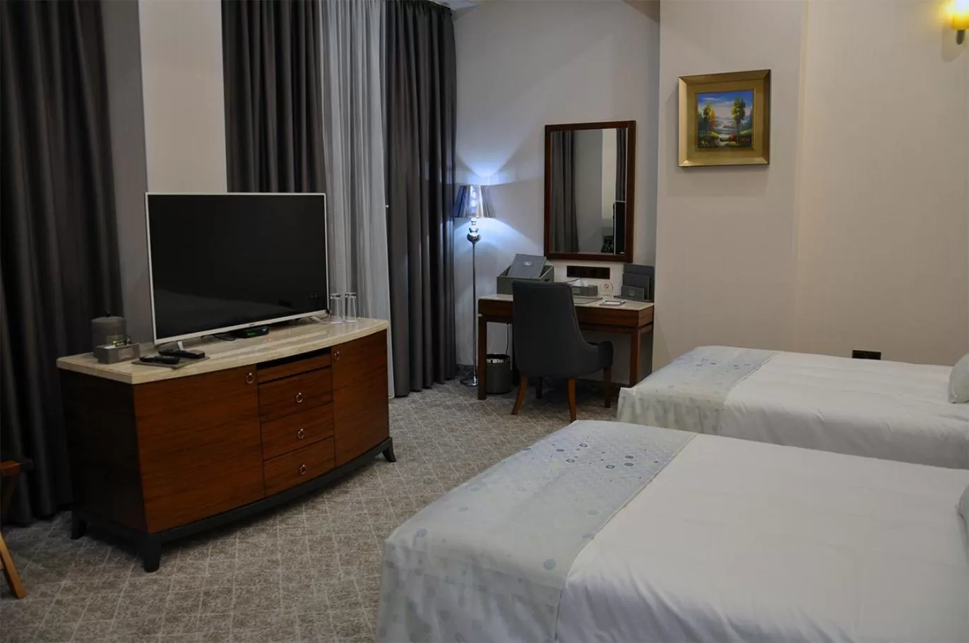 Bed in Parliament Palace Hotel