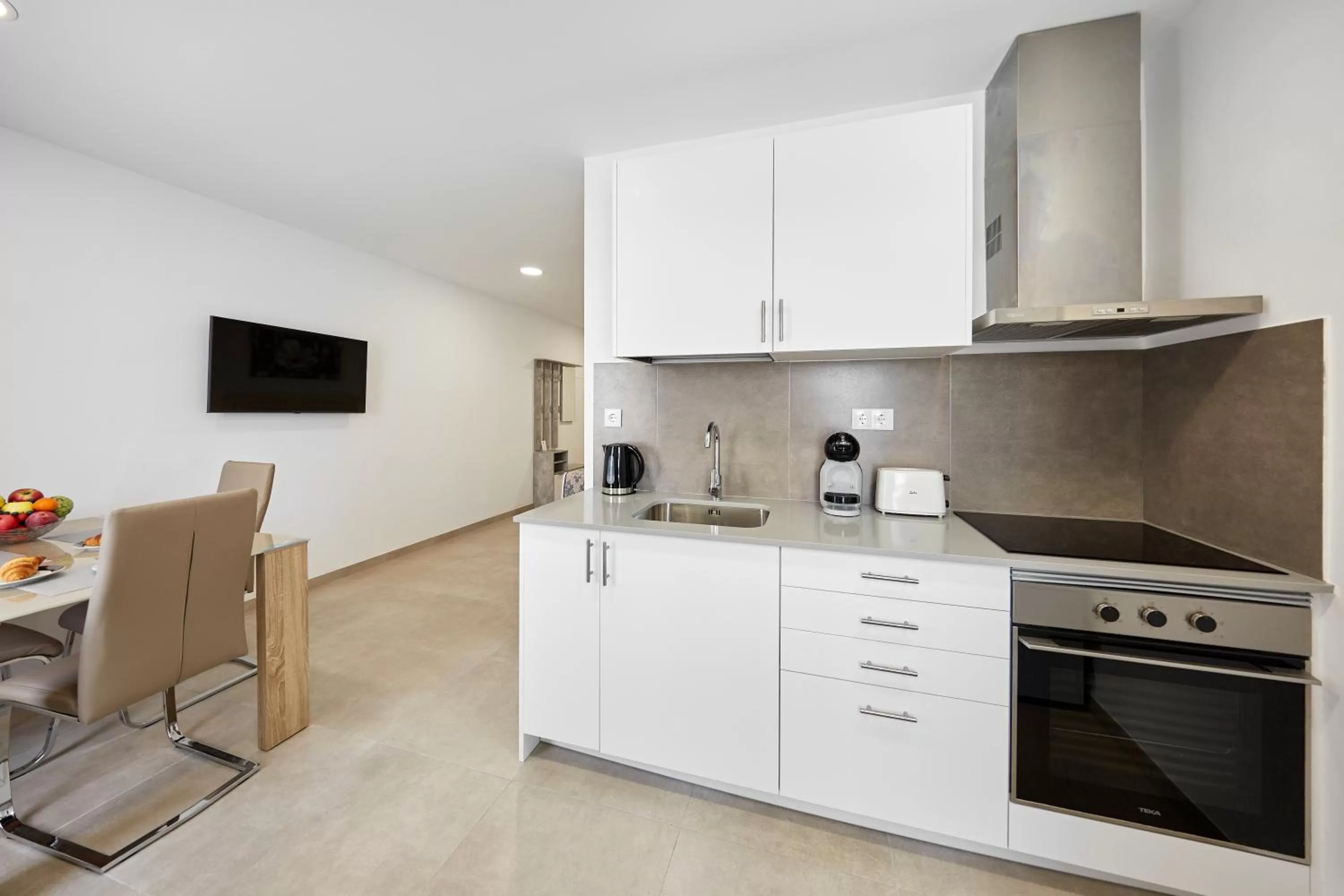 TV and multimedia in Sonrisa Deluxe Apartments, Levante