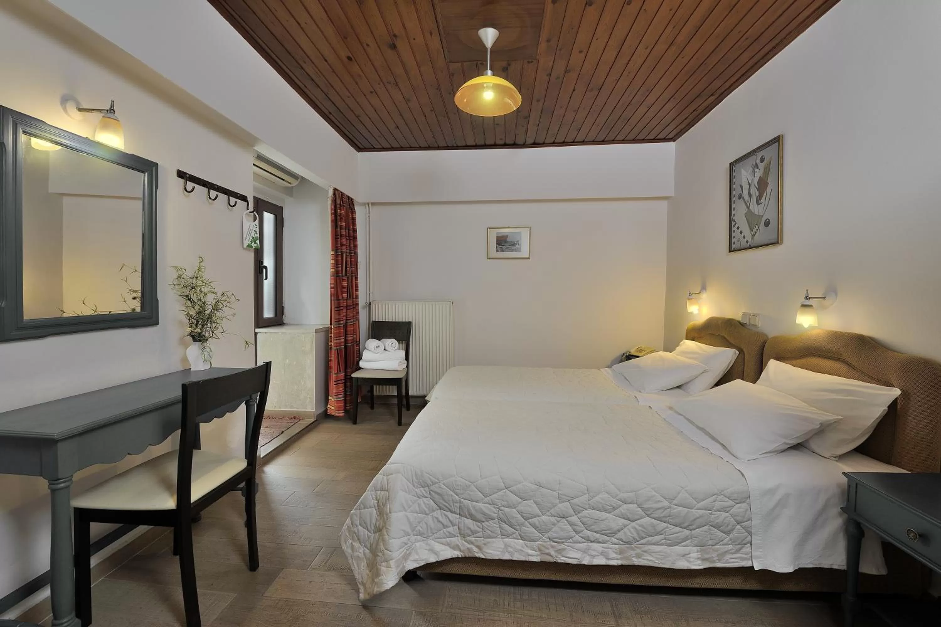 Photo of the whole room in Dryades & Orion Hotel