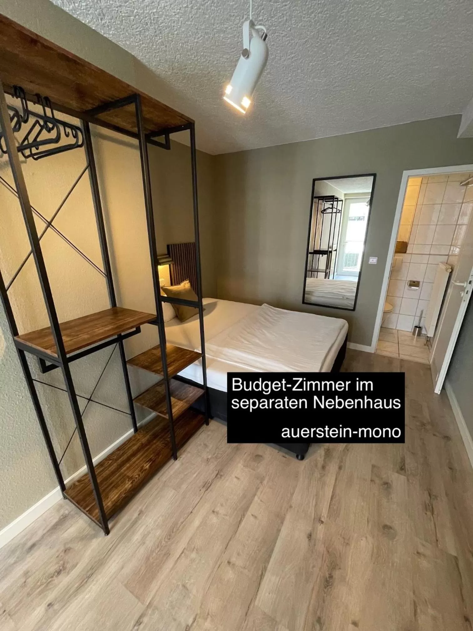 Bed in AUERSTEIN-Hotels auerstein & auerstein-mono