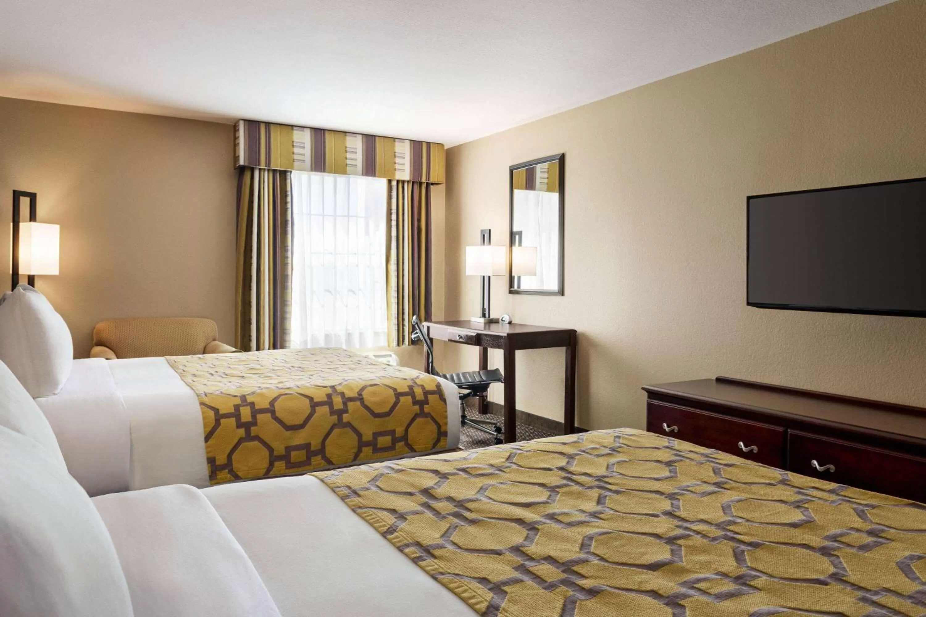 Photo of the whole room, Bed in Baymont by Wyndham Wichita Falls