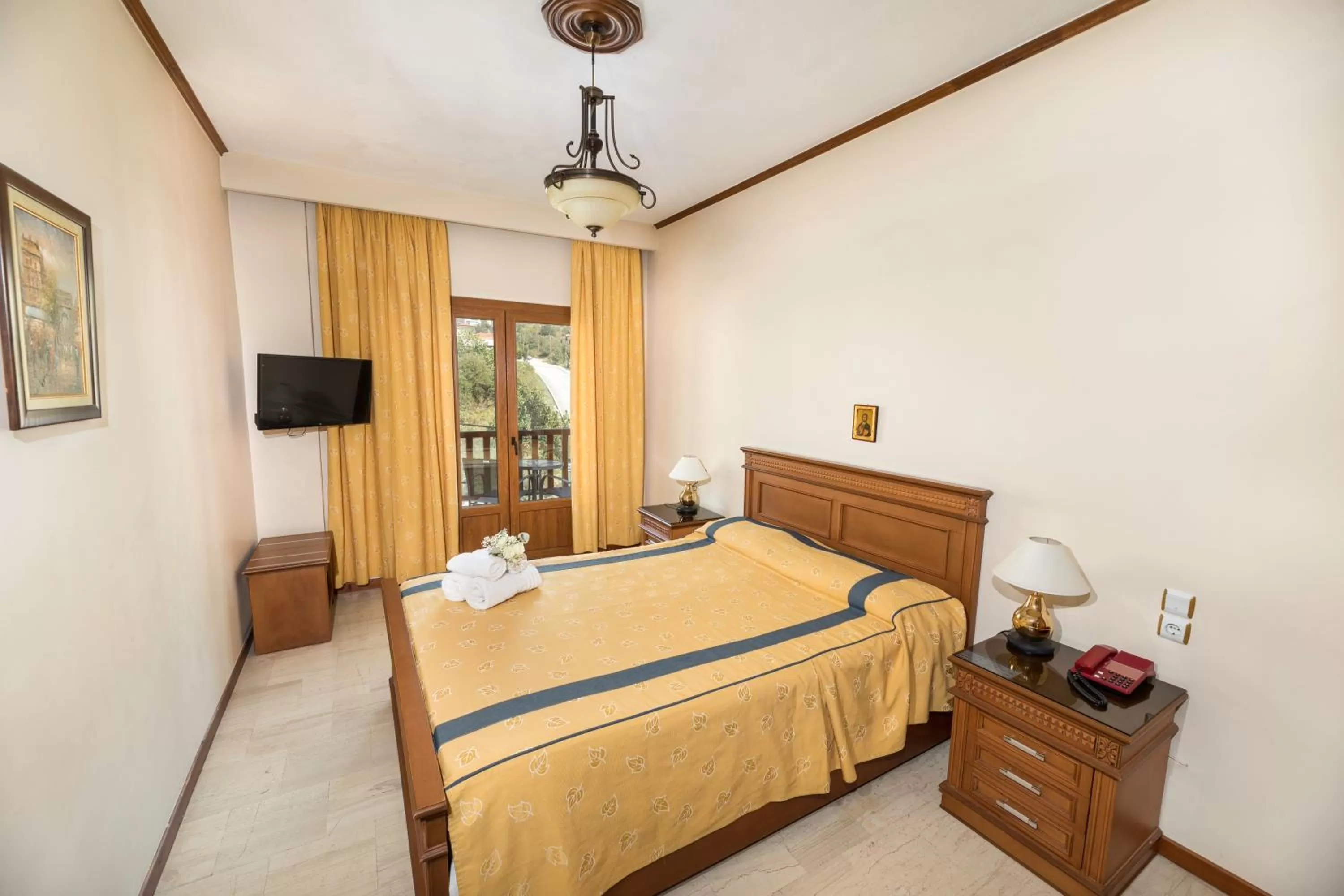 Bed in Famissi Hotel