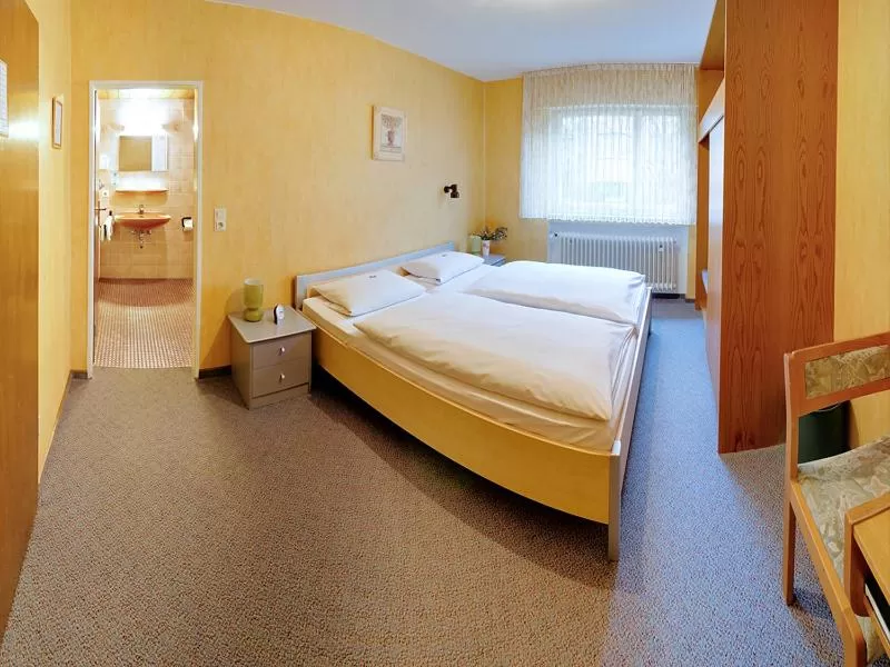 Photo of the whole room, Bed in Hotel Keinath Stuttgart