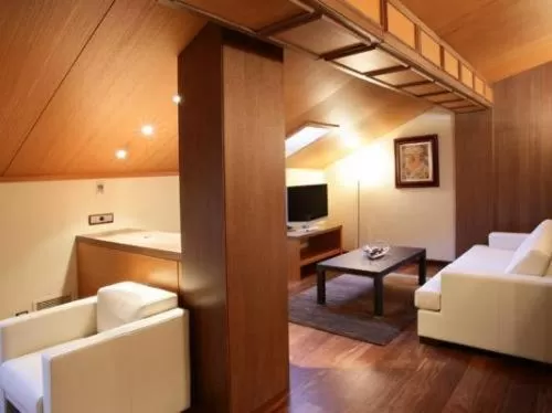 Living room, Bed in Hotel Ríos