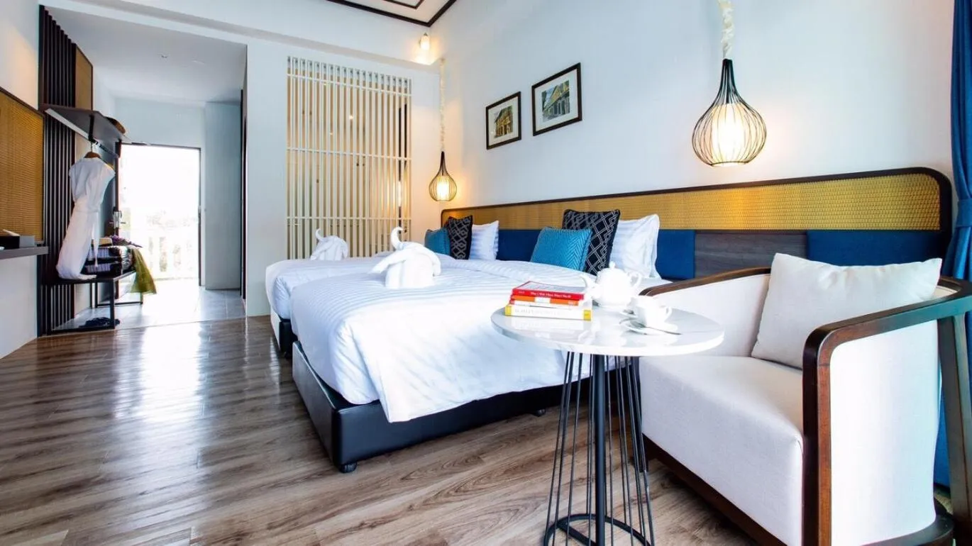 Bed in Chaanburi Boutique Resort