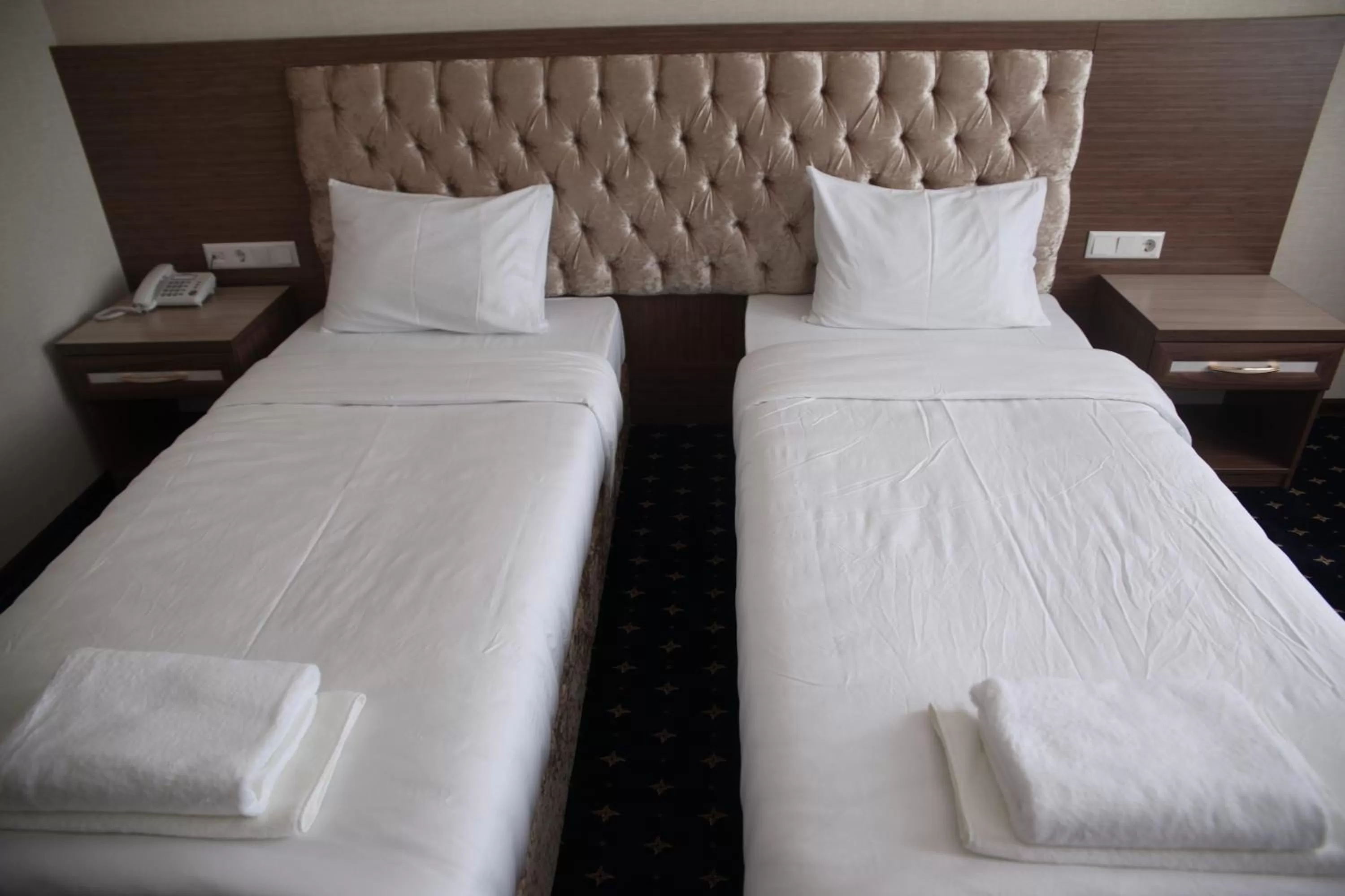 Bed in Hotel Khanaka