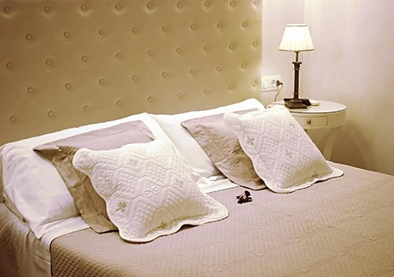 Decorative detail, Bed in Locanda Navona