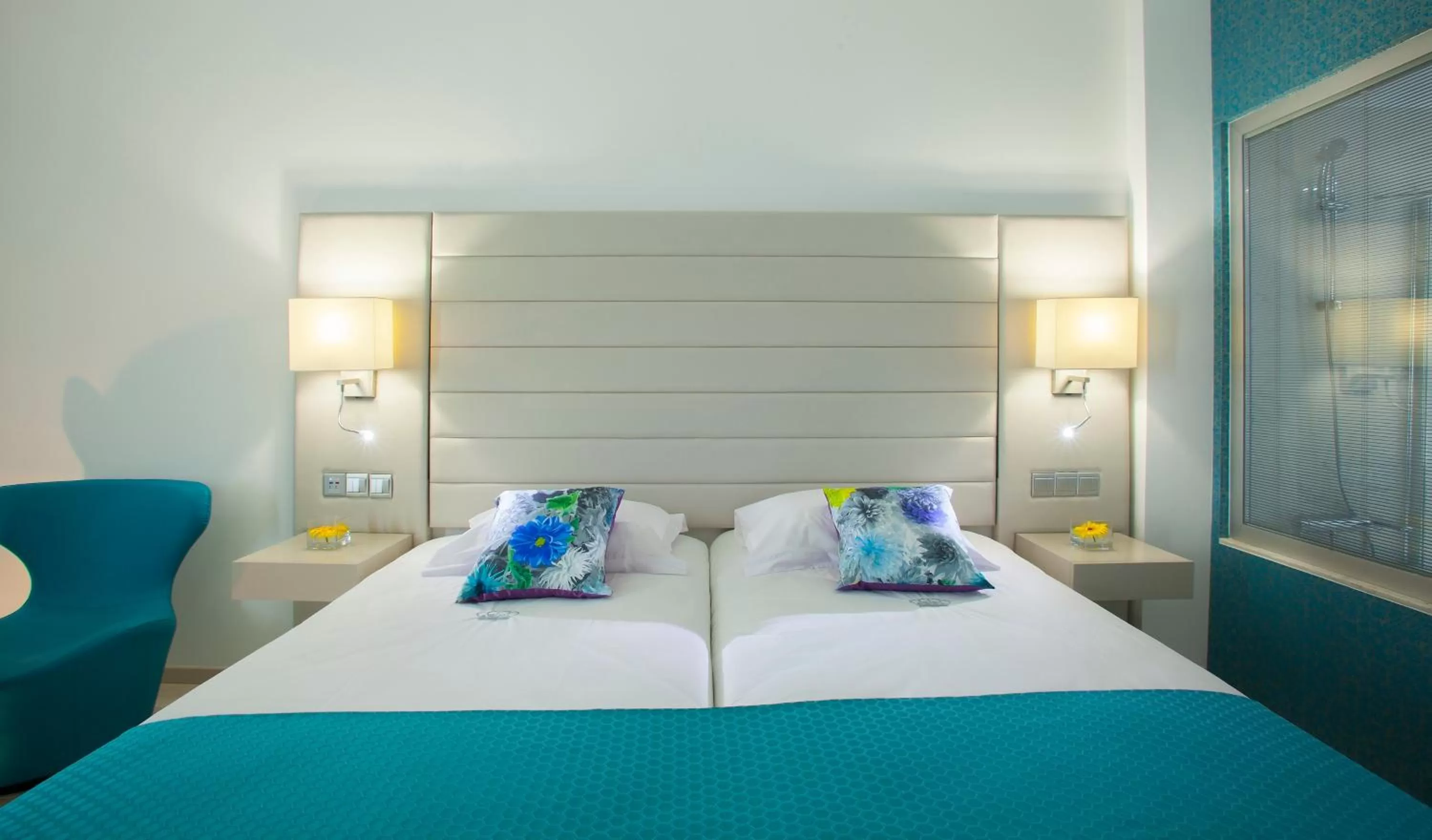 Bed in King Evelthon Beach Hotel & Resort