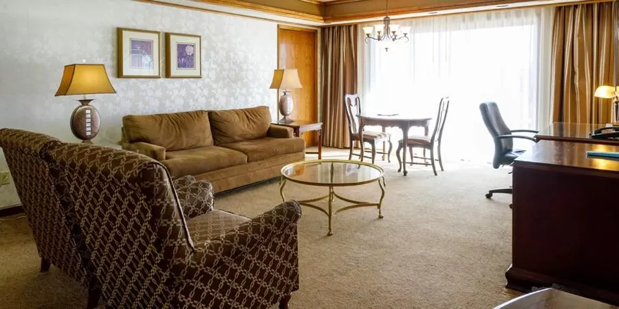 Living room in Maverick Hotel and Casino by Red Lion Hotels