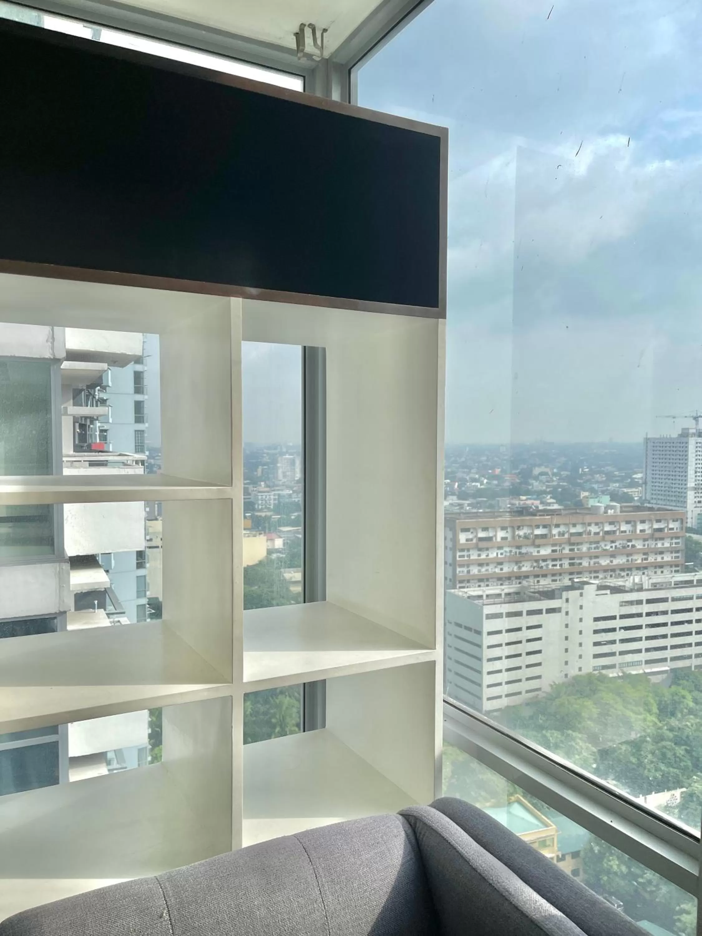 Living room in Cubao, Quezon City Condo Staycation (wifi and netflix ready)