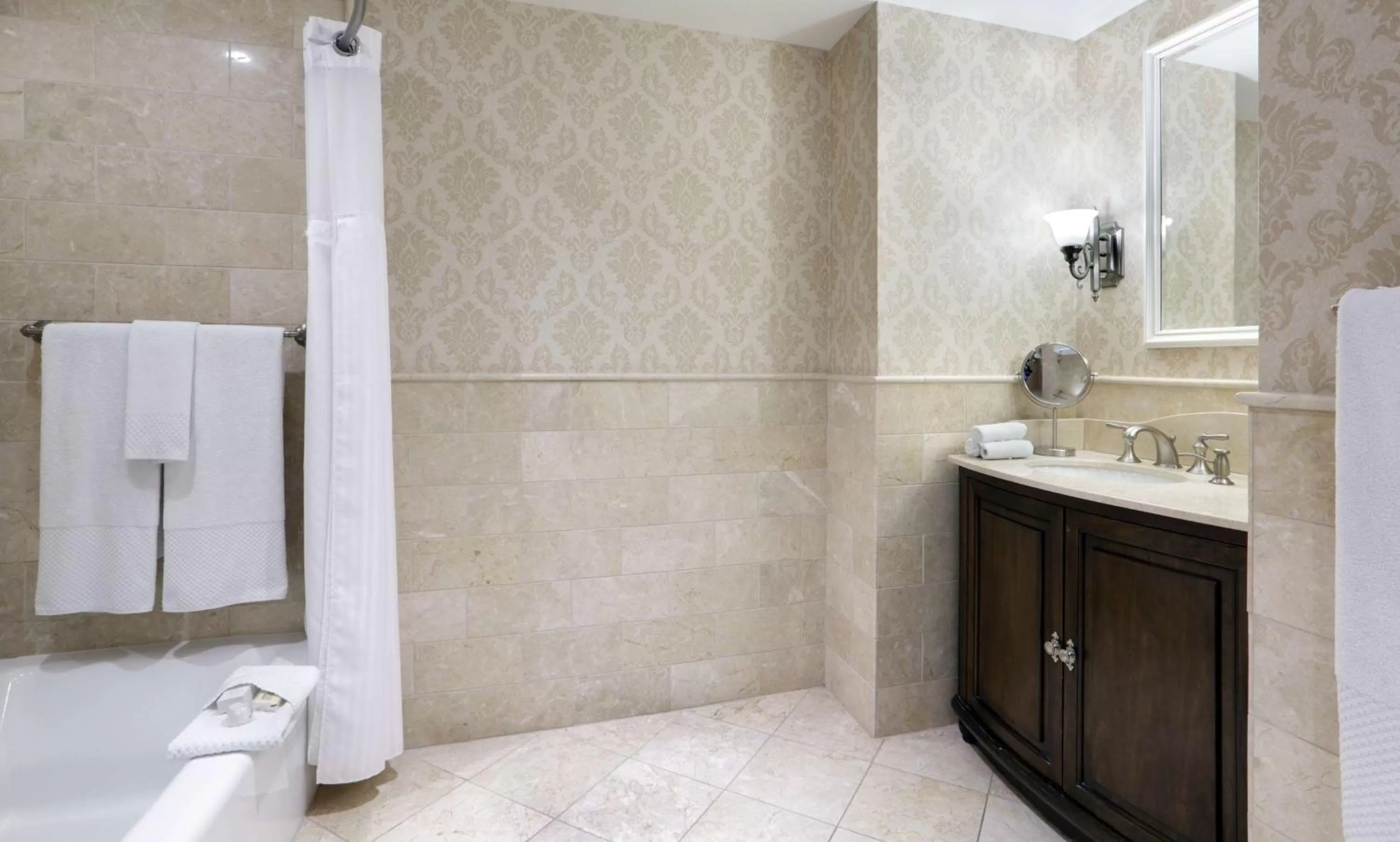 Bathroom in Madison Beach Hotel, Curio Collection by Hilton