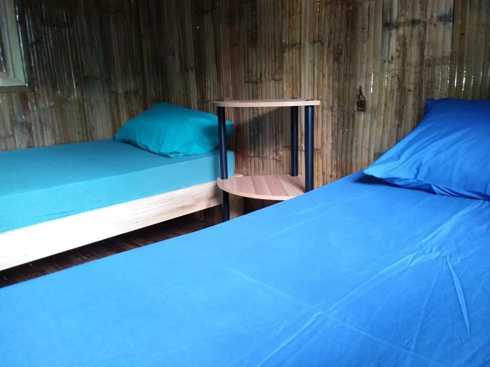 Photo of the whole room, Bed in AivyMaes Divers Resort