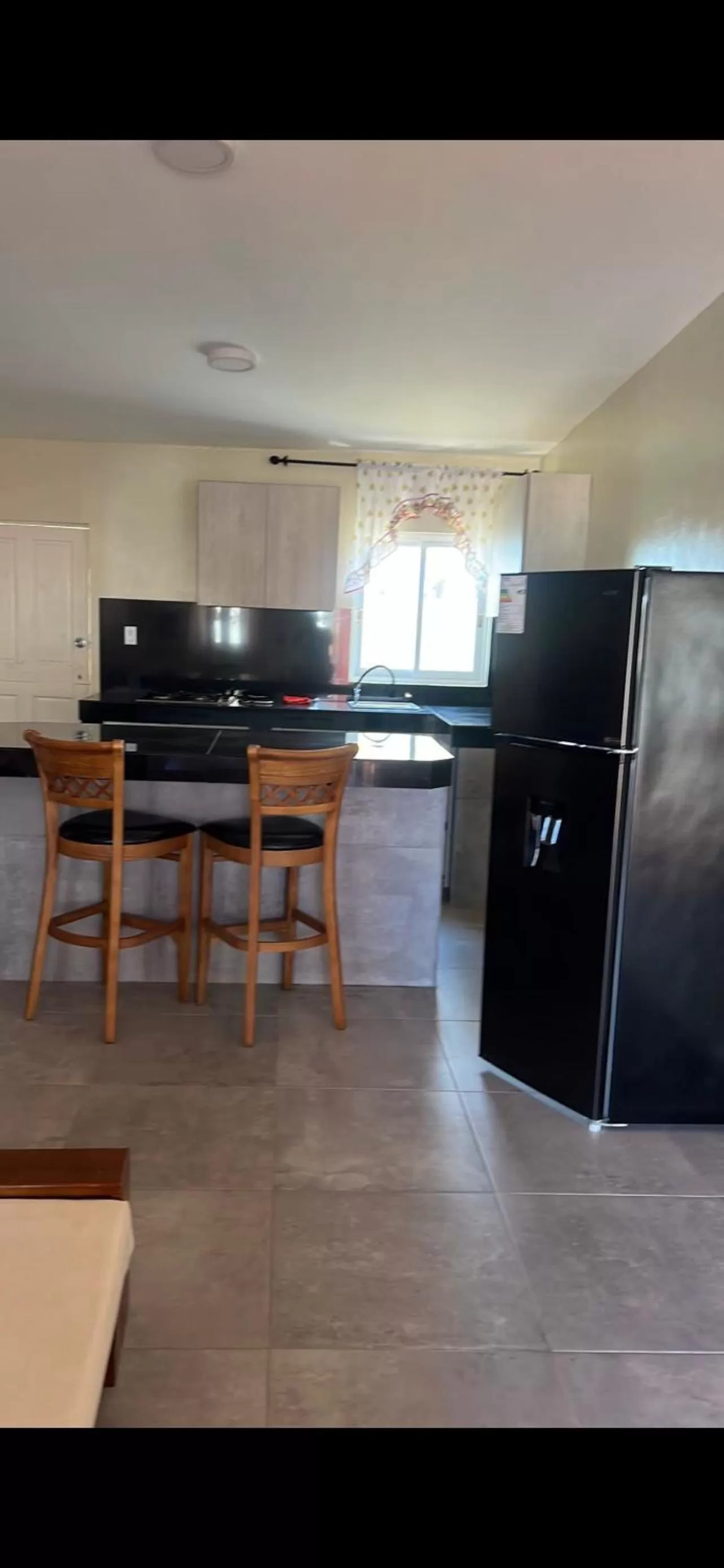 Kitchen/Kitchenette in Curasita colour Appartments