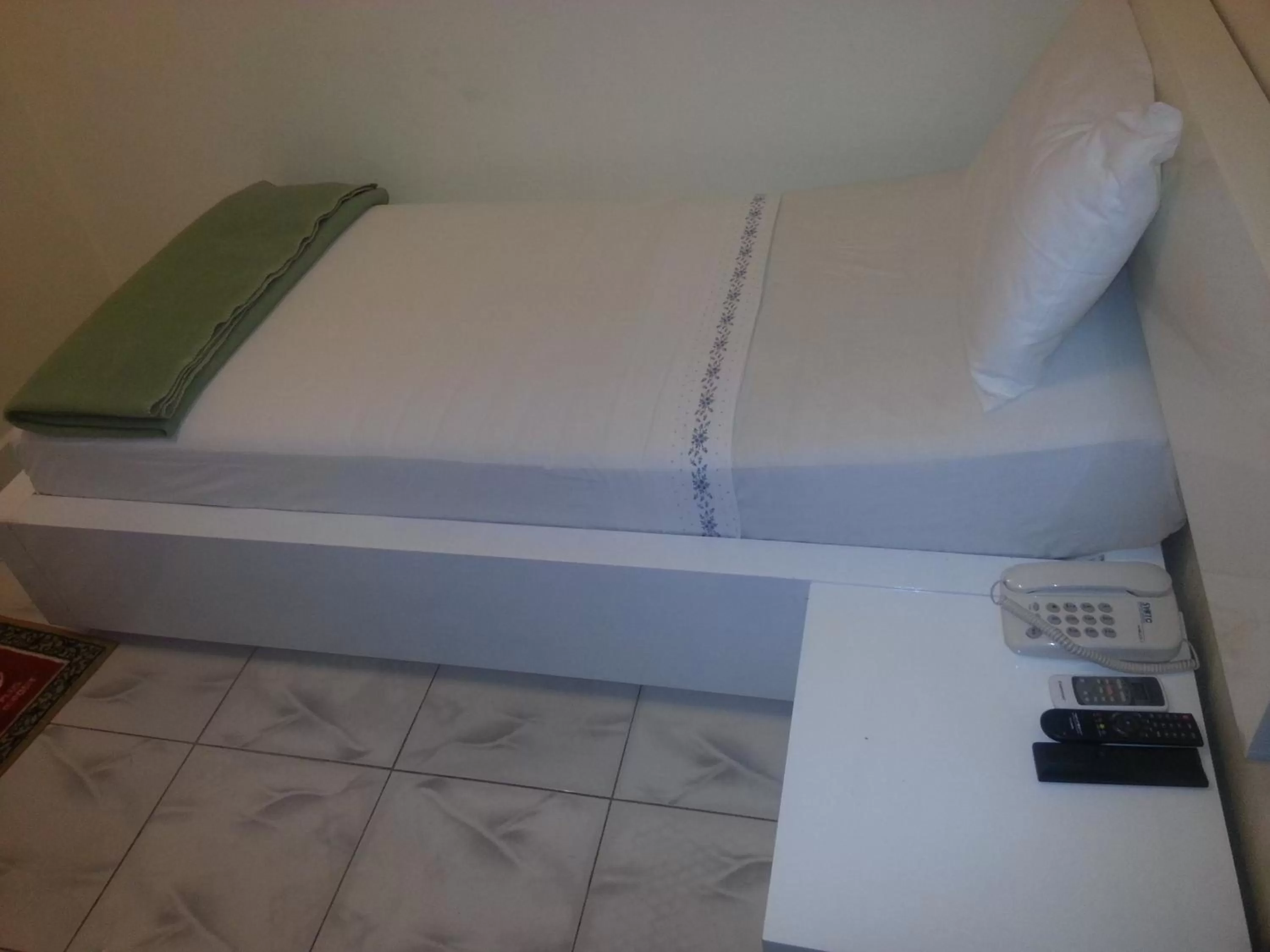 Bed in Woodpecker Resort Hotel