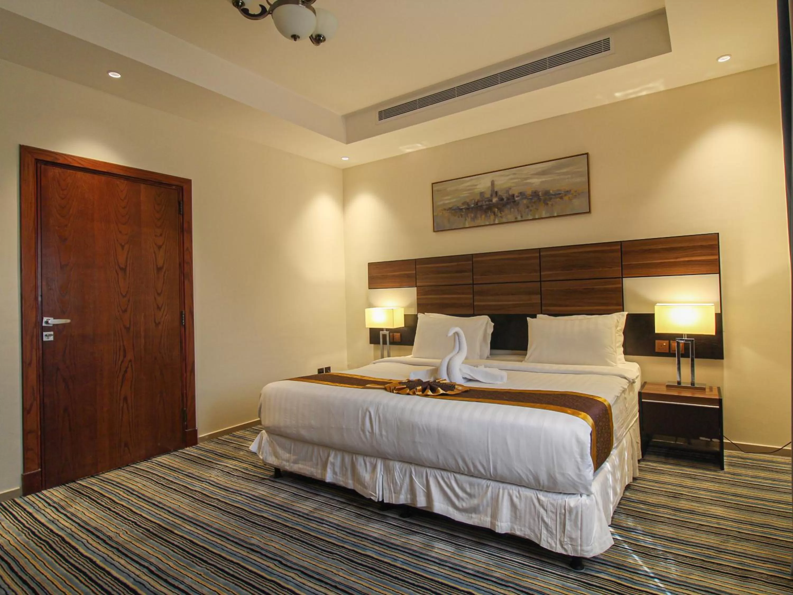 Bed in Friesian Hotel Suites