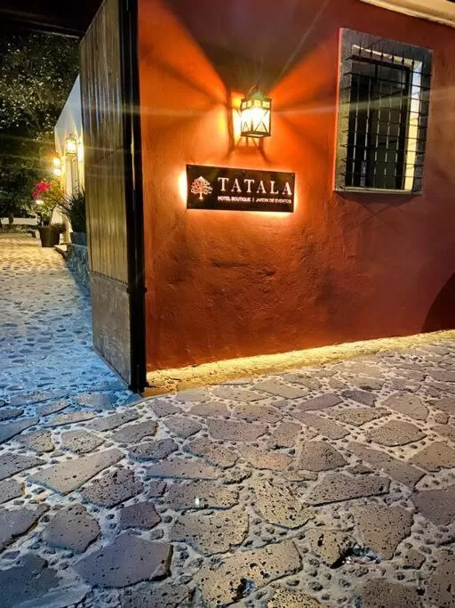 Property logo or sign in Tatala Hotel & Garden