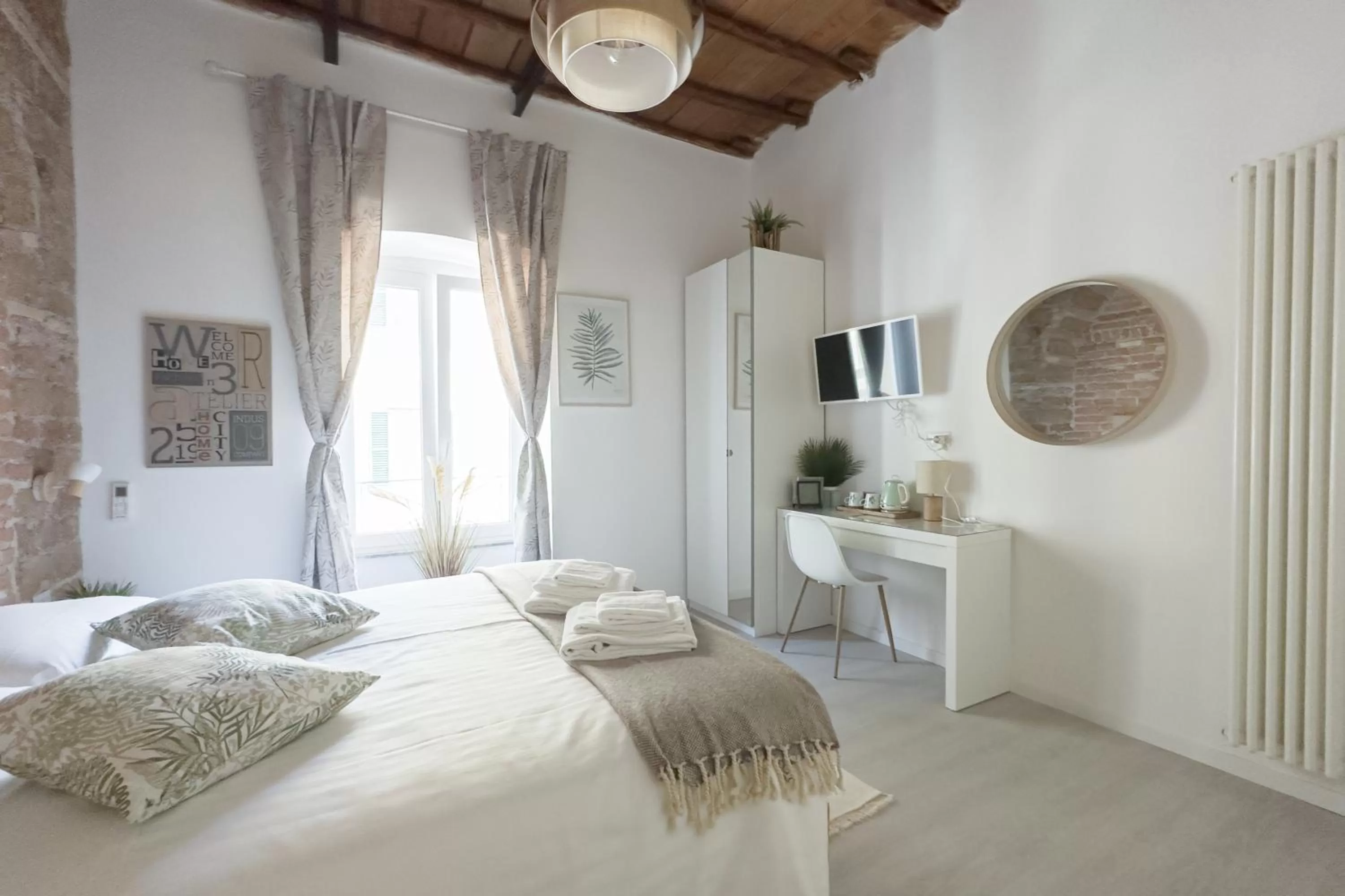 Bed in White Ostilia B&B