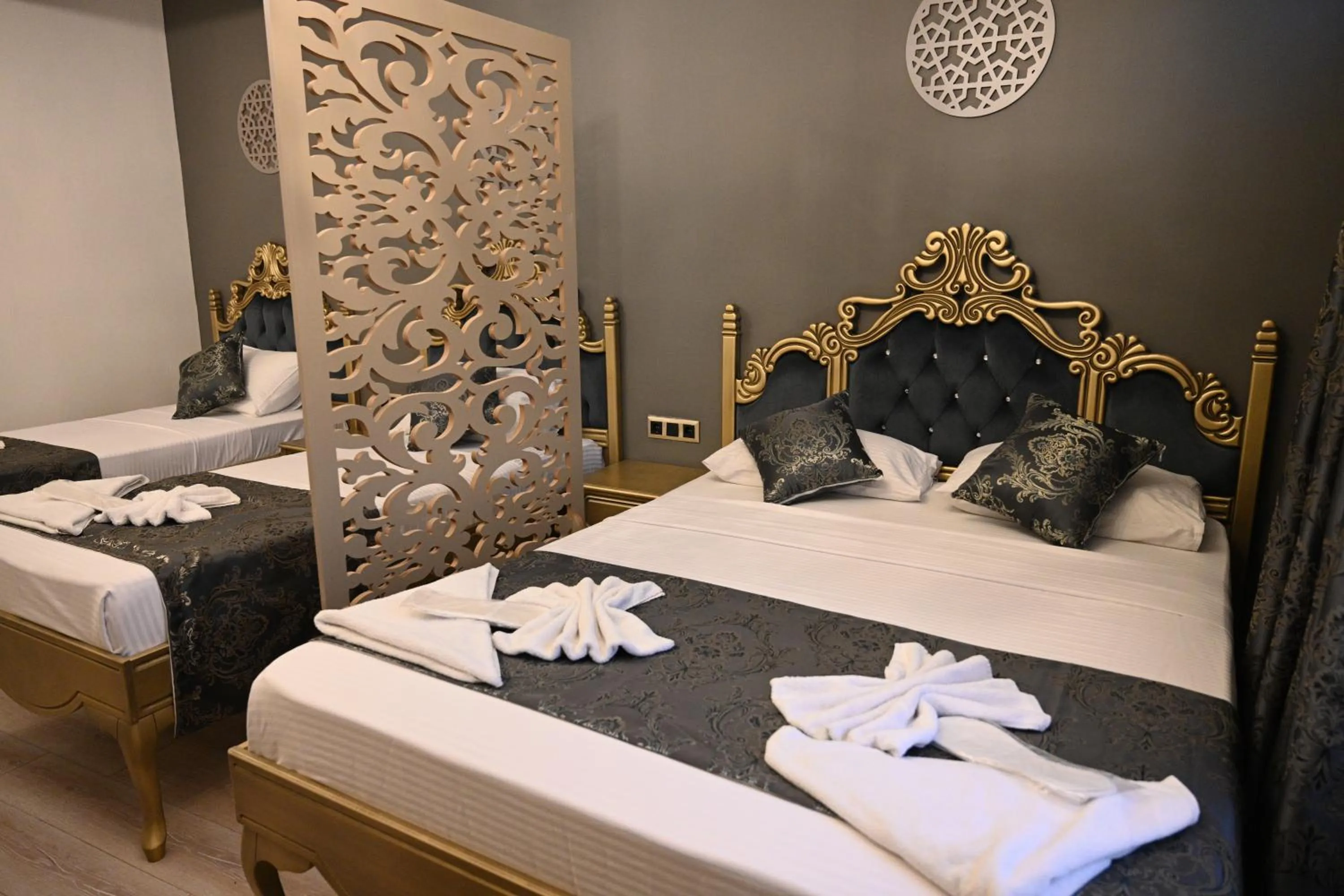 Bed in Ethnica Suites