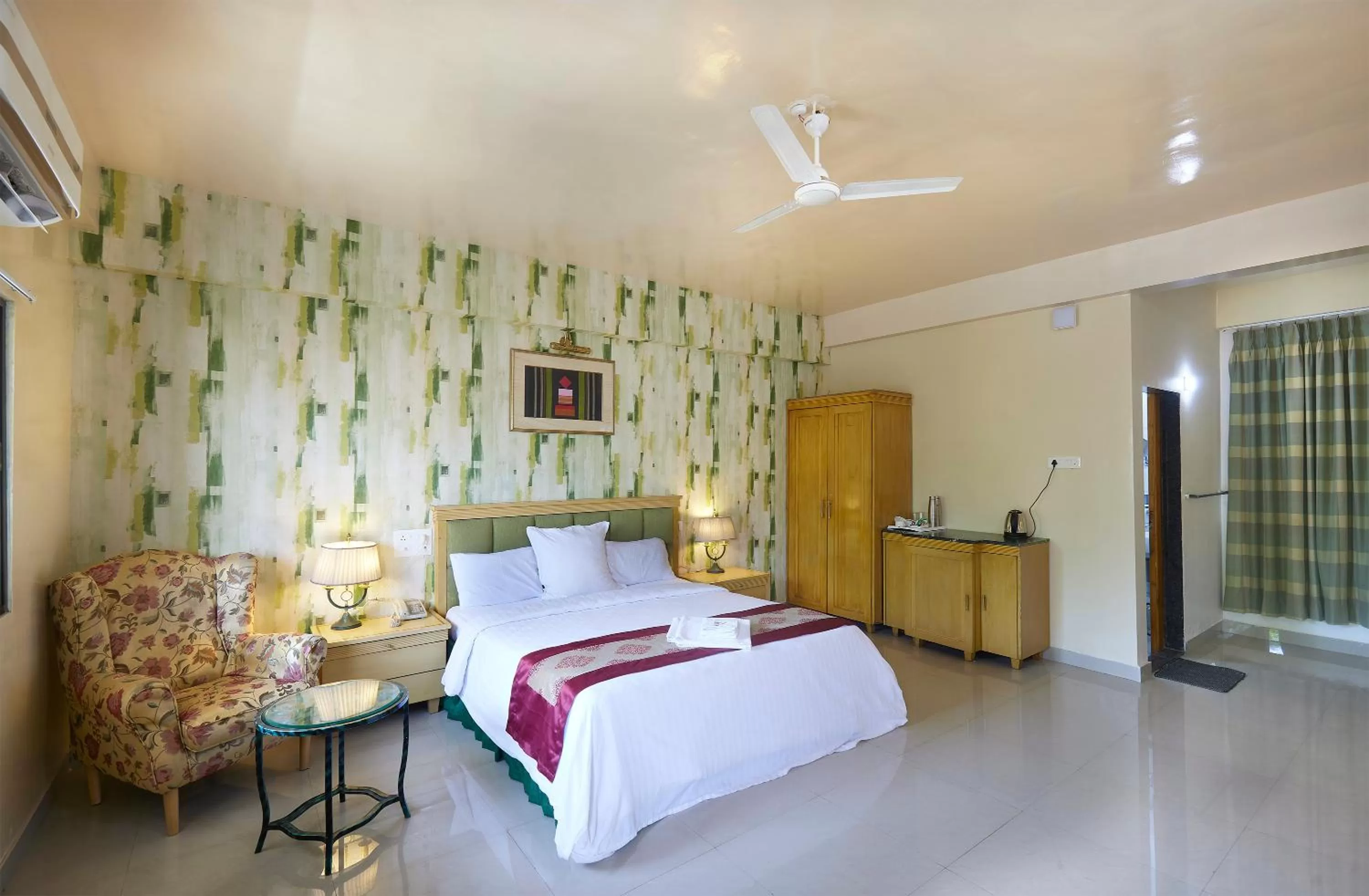 Bed in Mango Valley Resort Ganpatipule