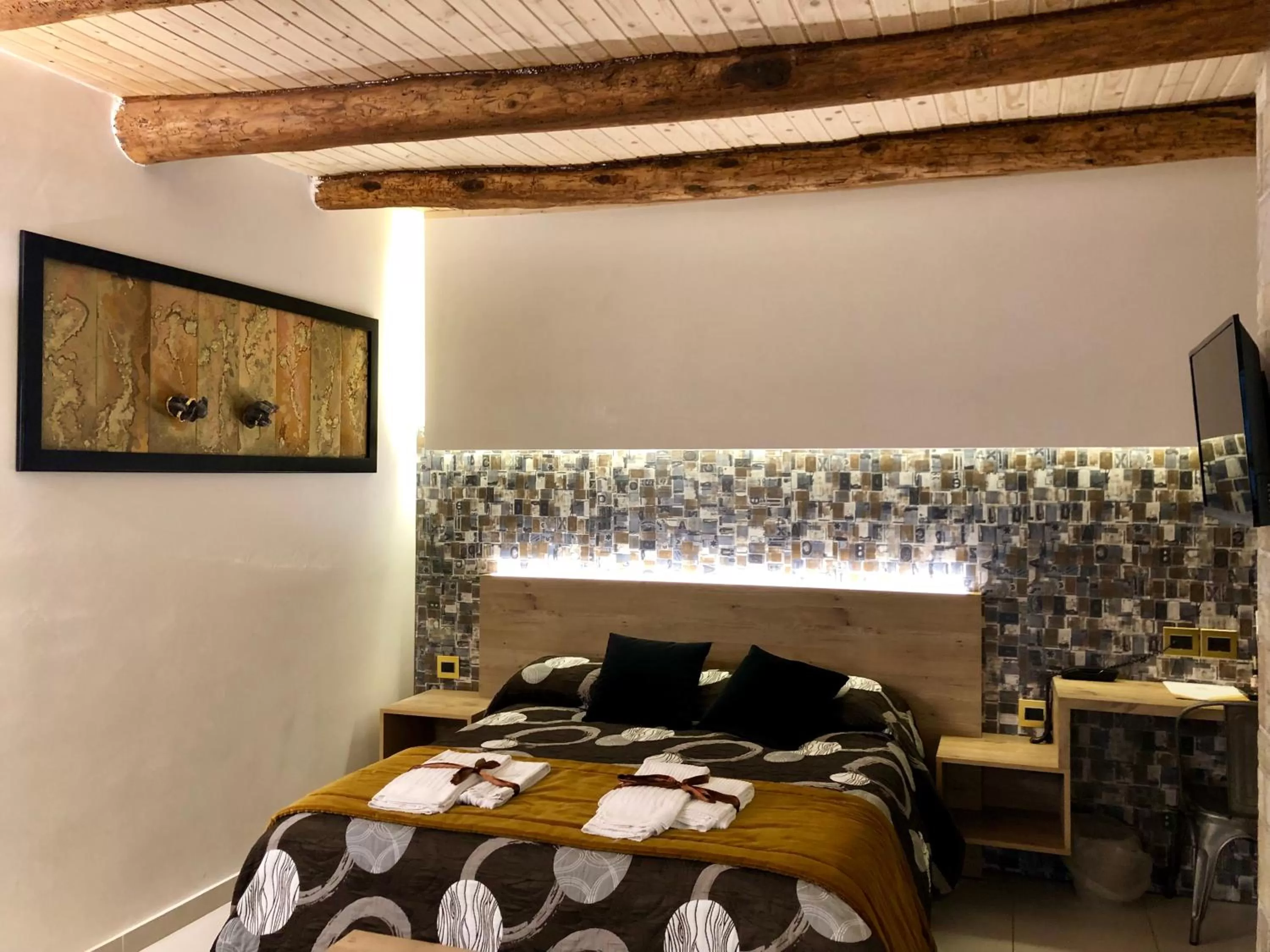 Bed in Relais Piazza Del Plebiscito B&B