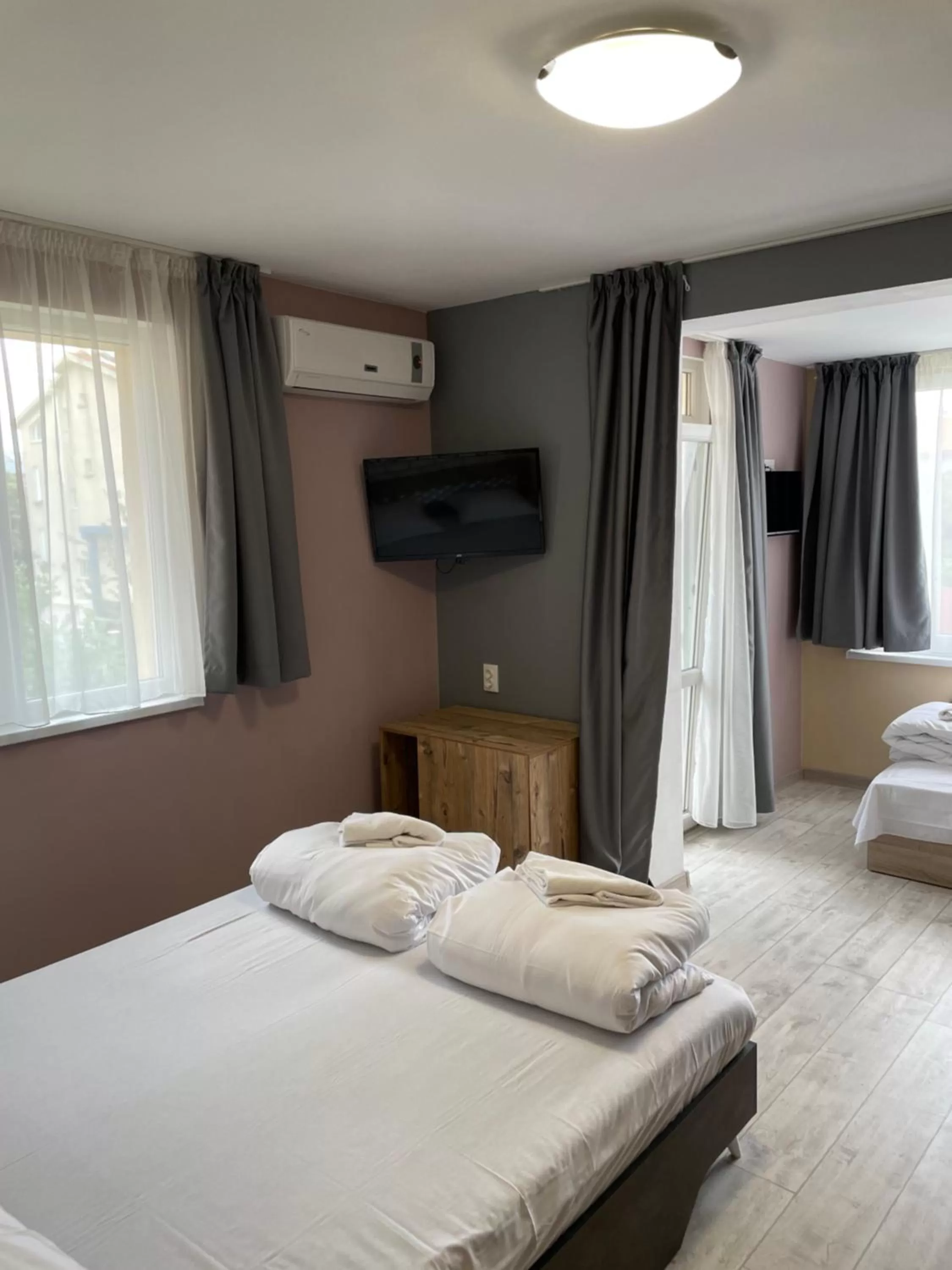 Bed in Family Hotel Malibu