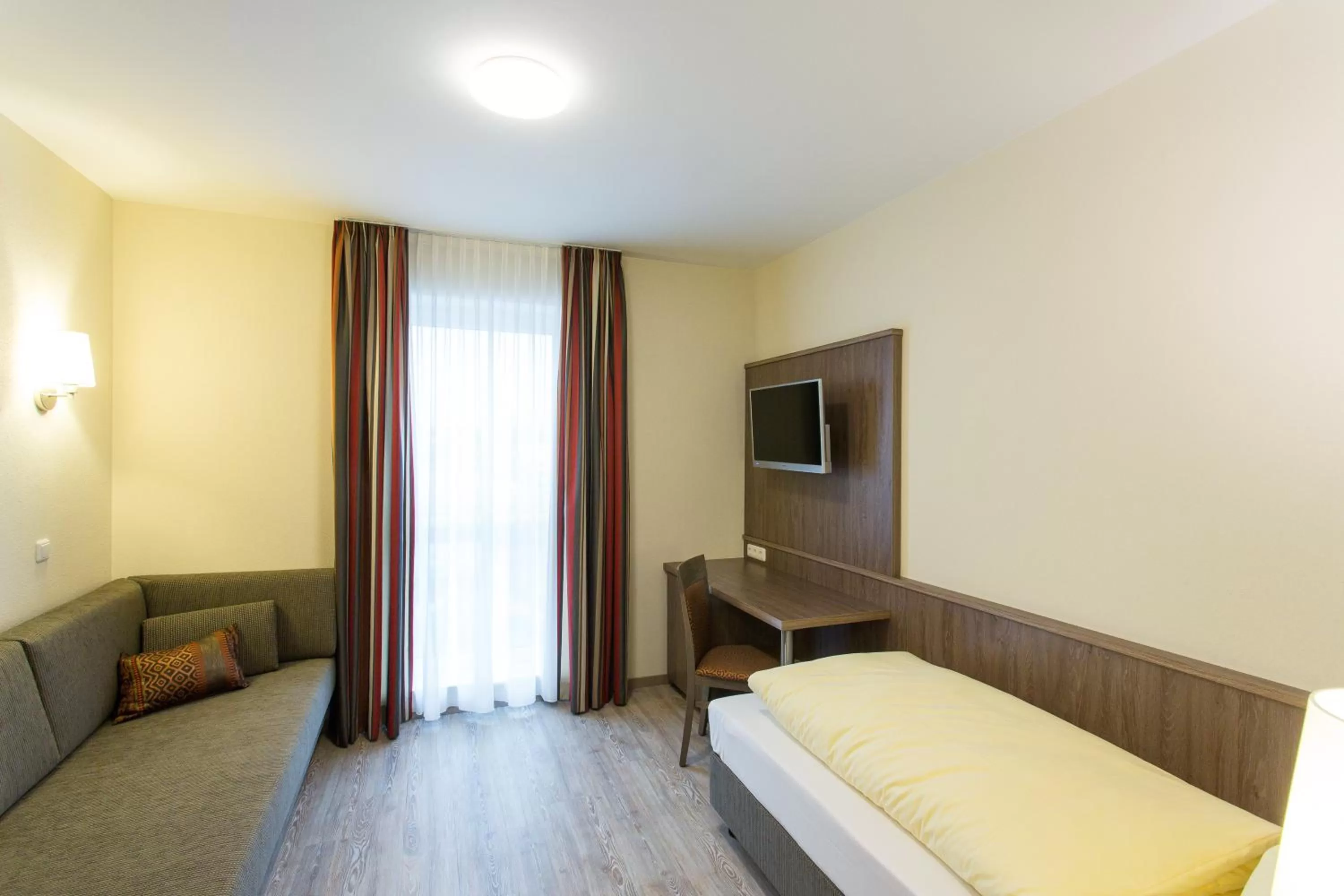 Photo of the whole room, Bed in CityApart Hotel