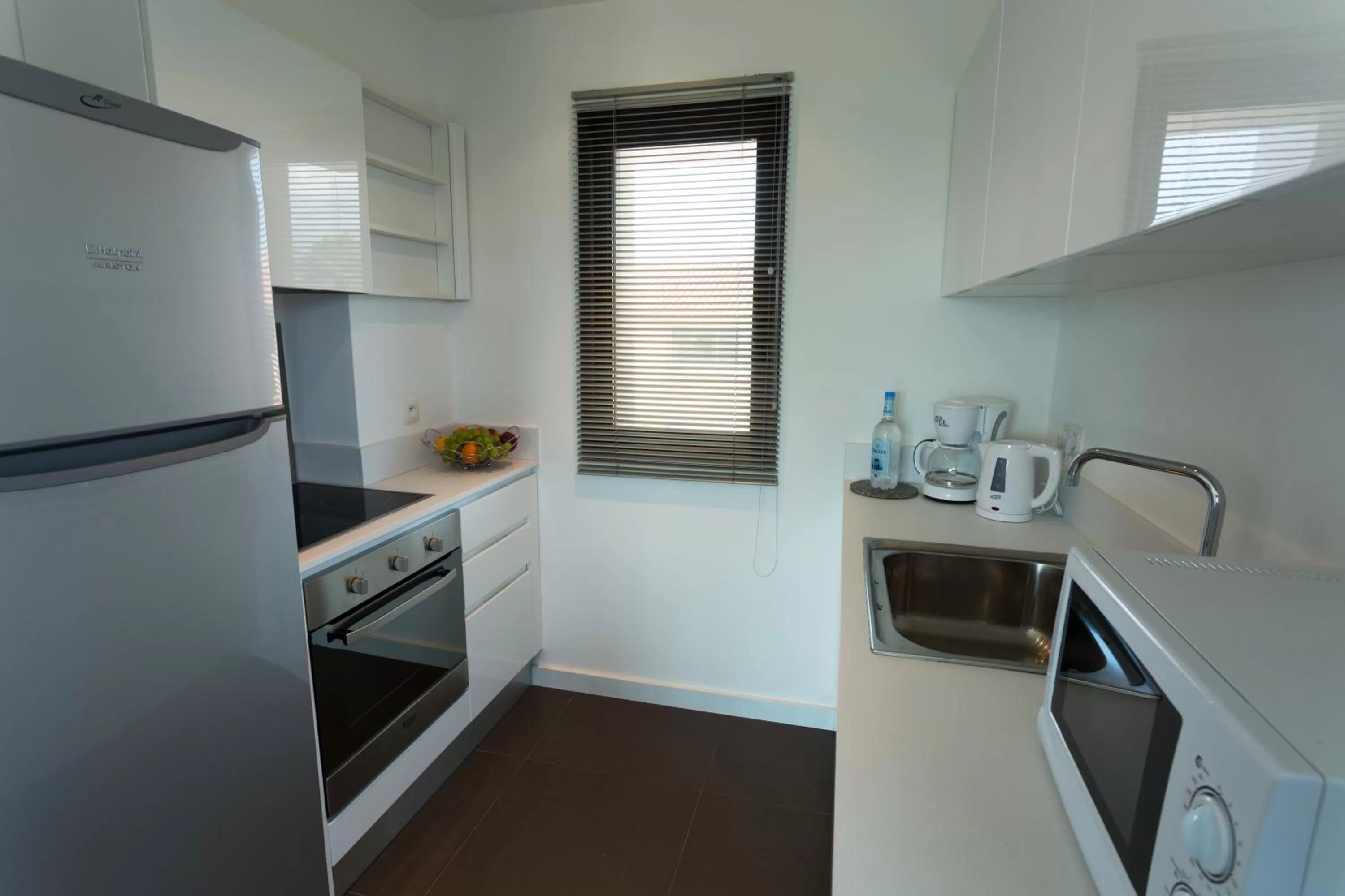 Kitchen or kitchenette in Résidence Hôtelière Alcyon