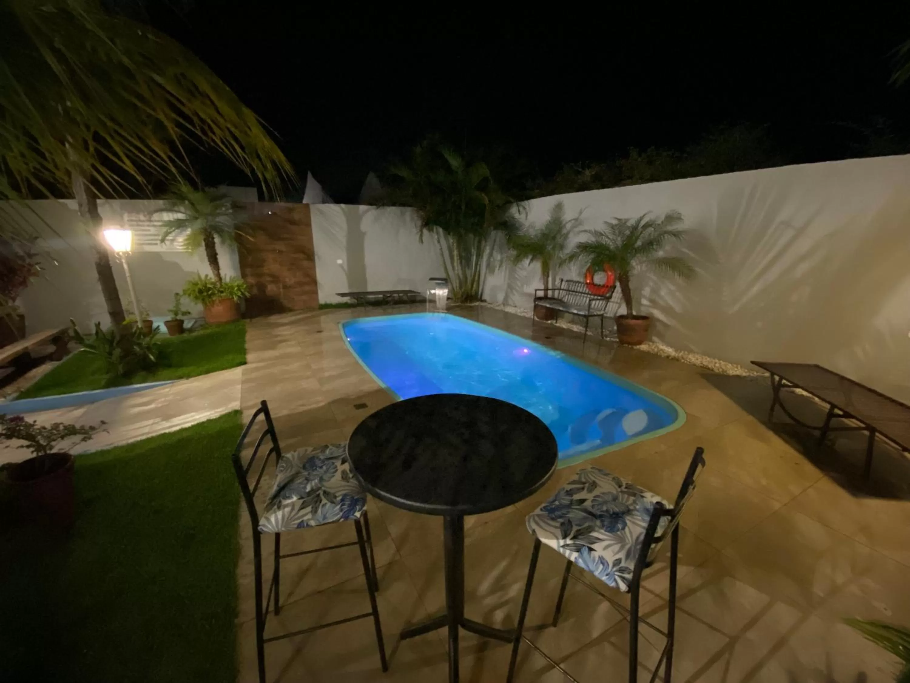 Swimming pool in Pousada Cambará Suítes