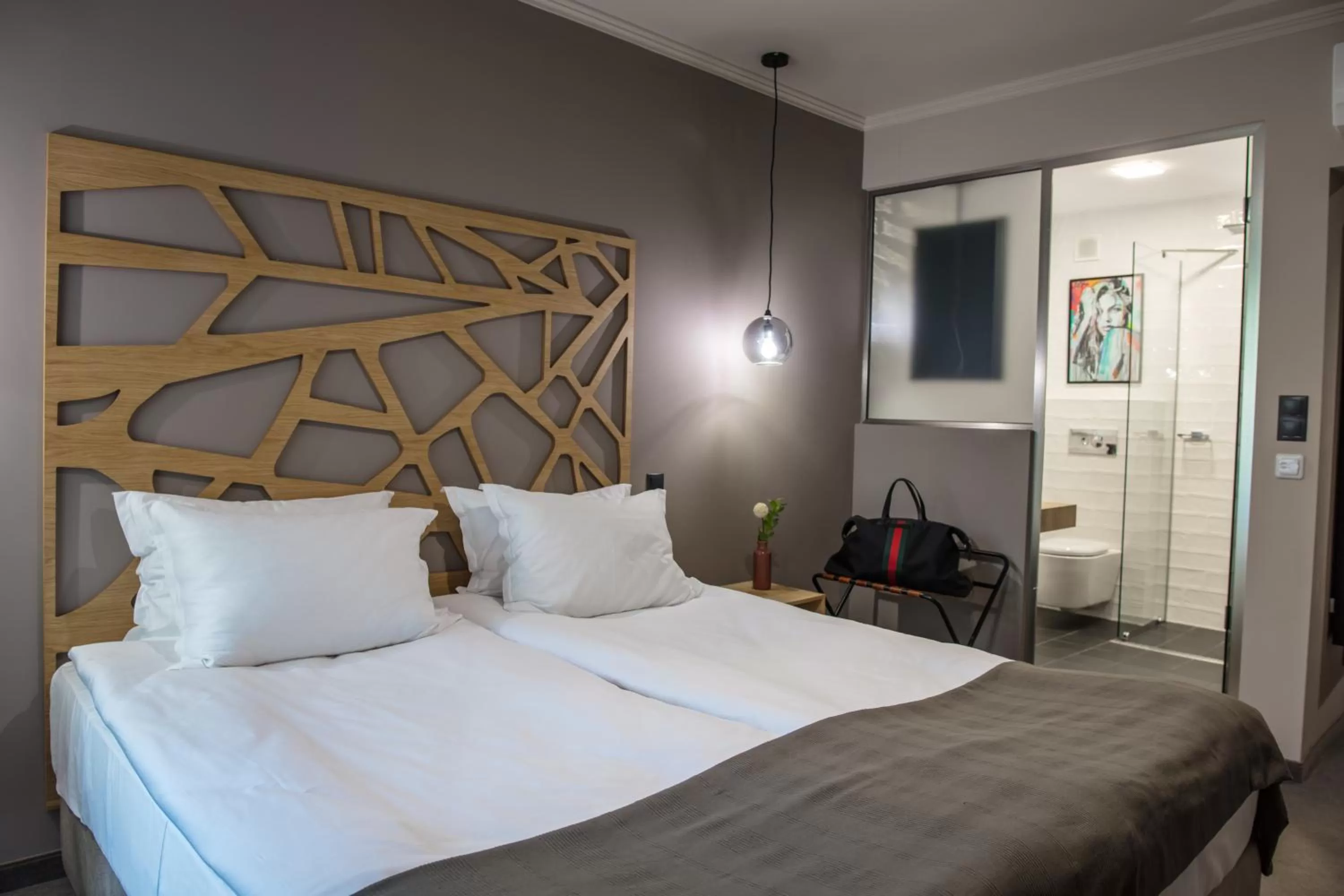 Bed in Reverence Boutique Hotel