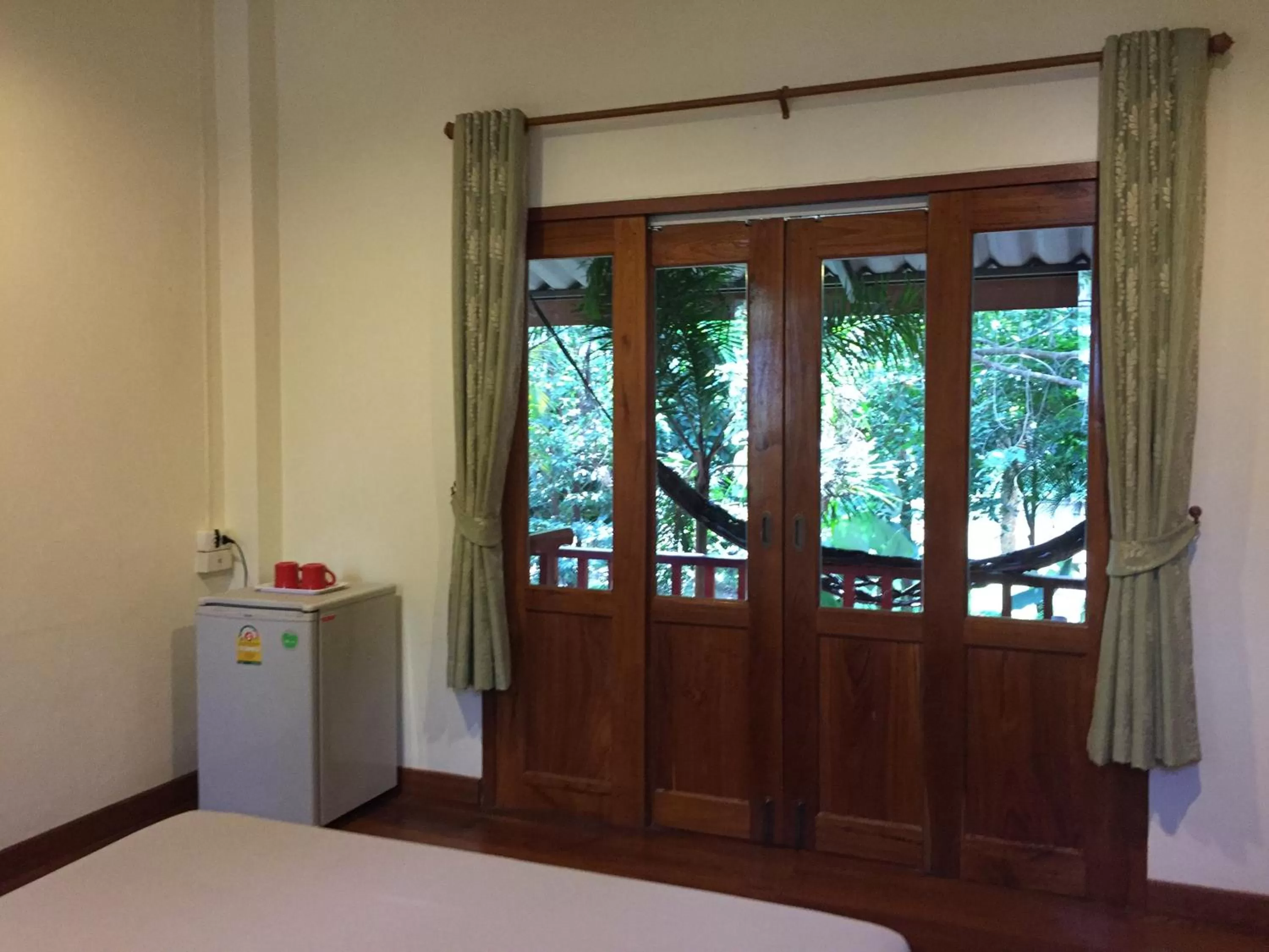 Bed in Pai Loess Resort
