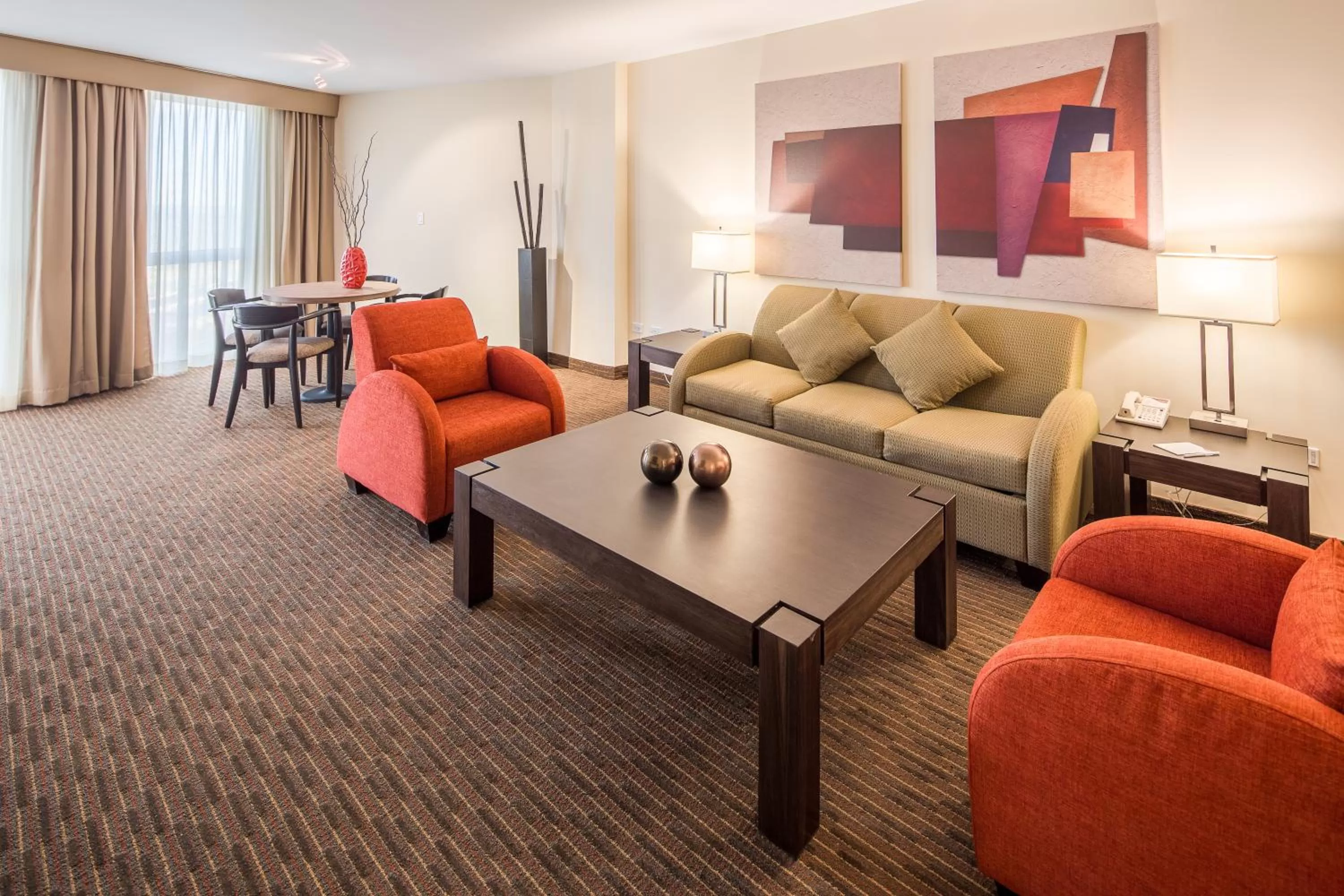 Living room in Crowne Plaza Monterrey Aeropuerto by IHG