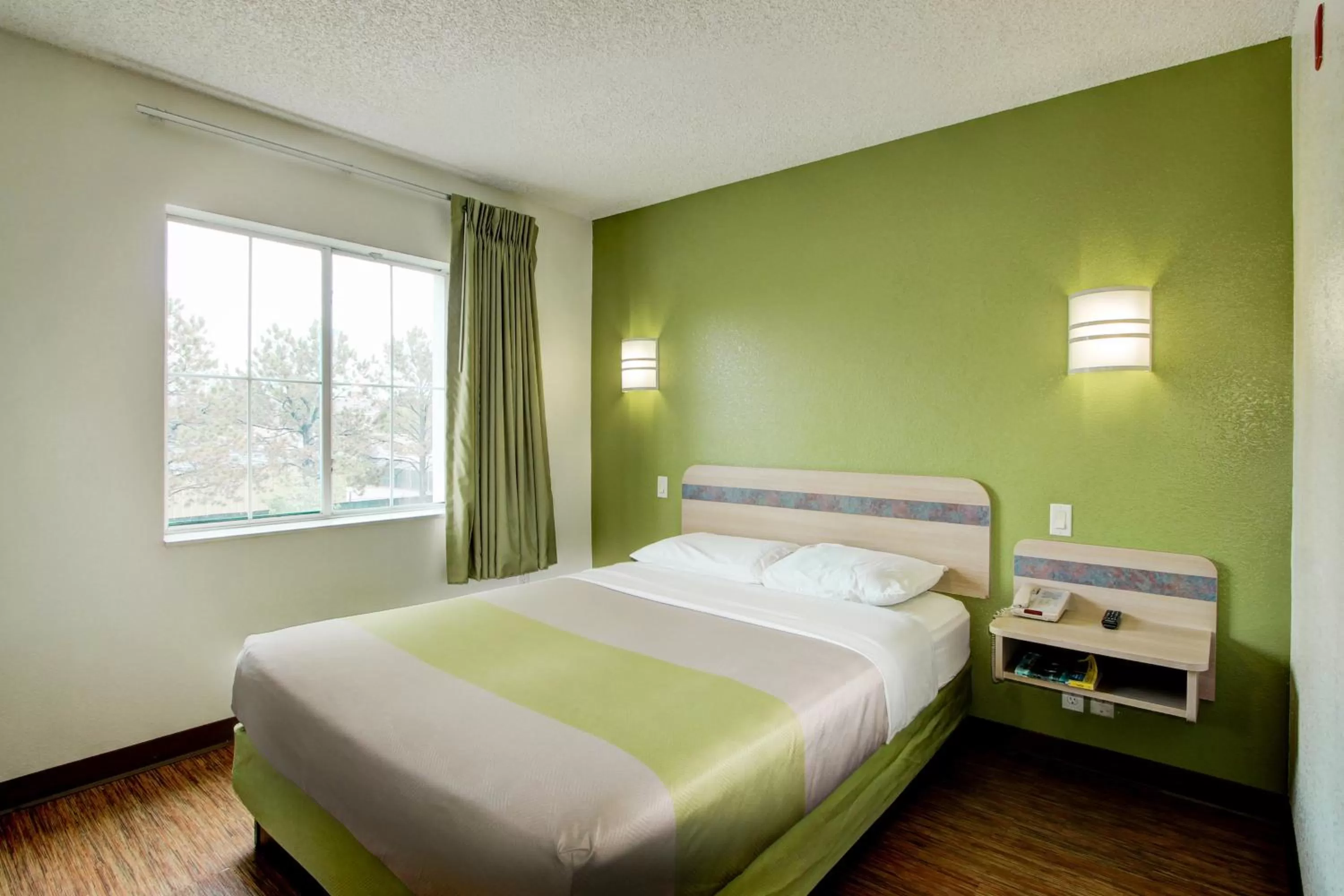 Bed in Super 8 by Wyndham Aurora East