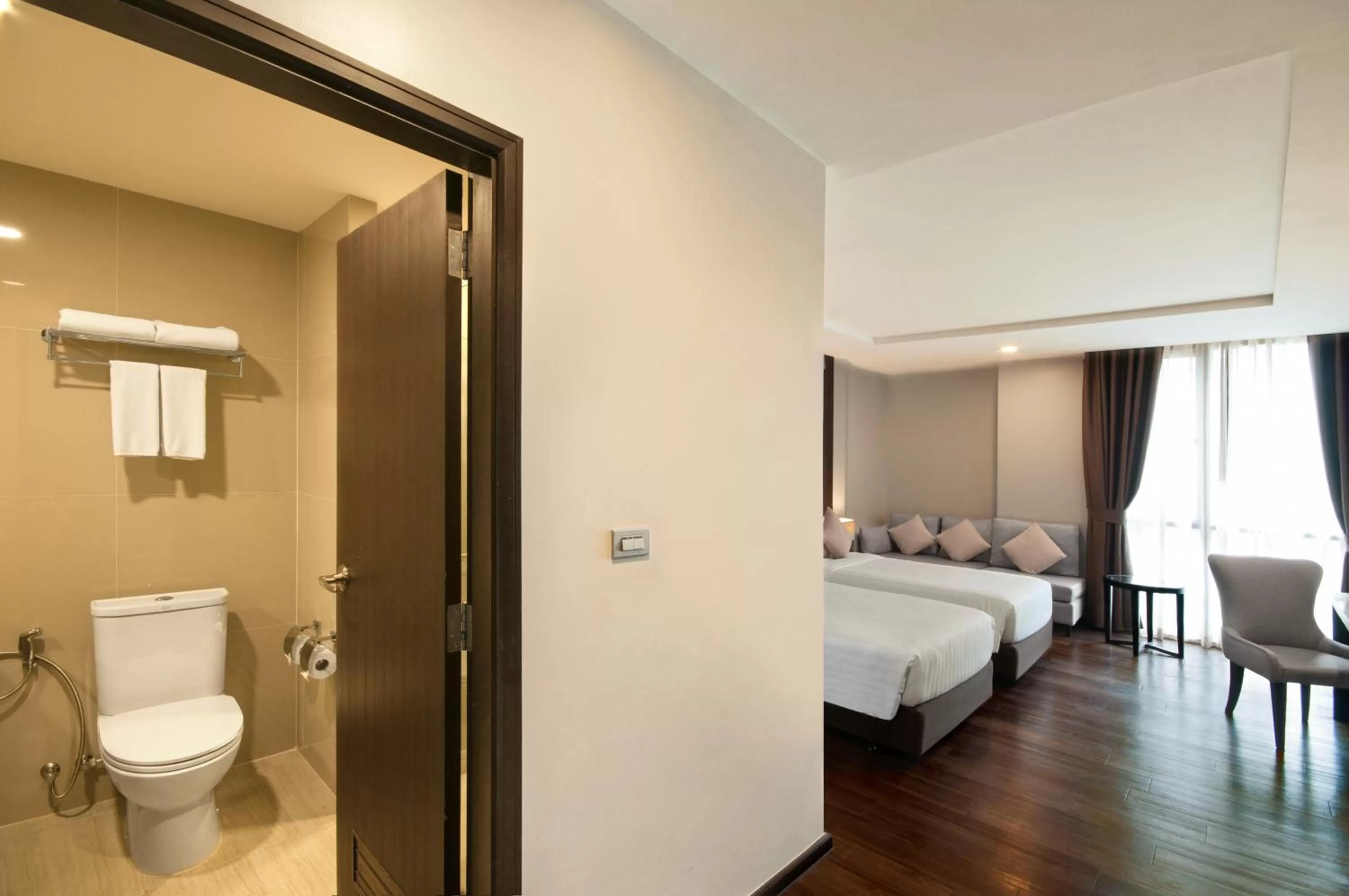 Bathroom in SureStay Plus by Best Western Sukhumvit 2