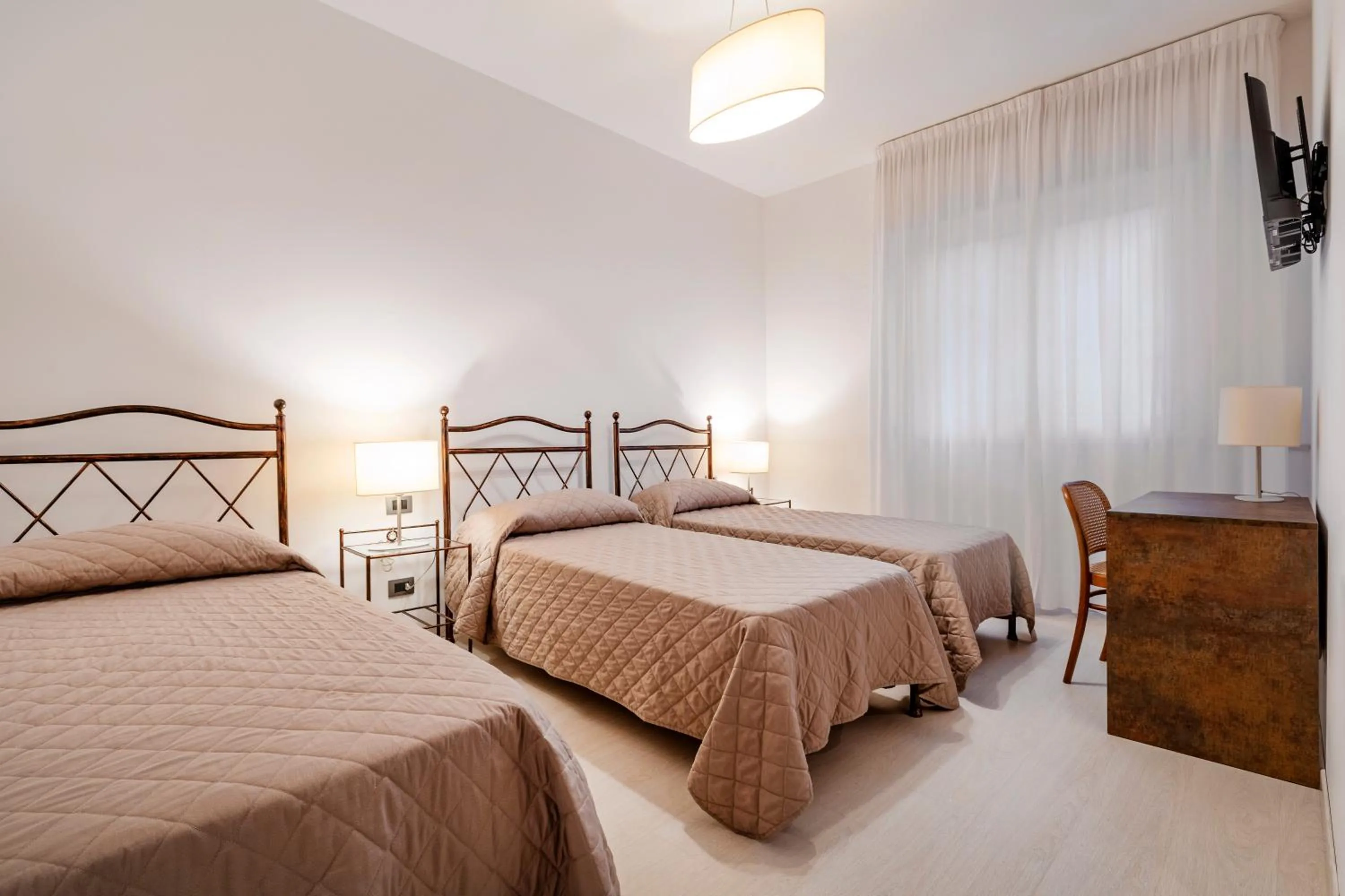 Bed in Hotel Sorriso