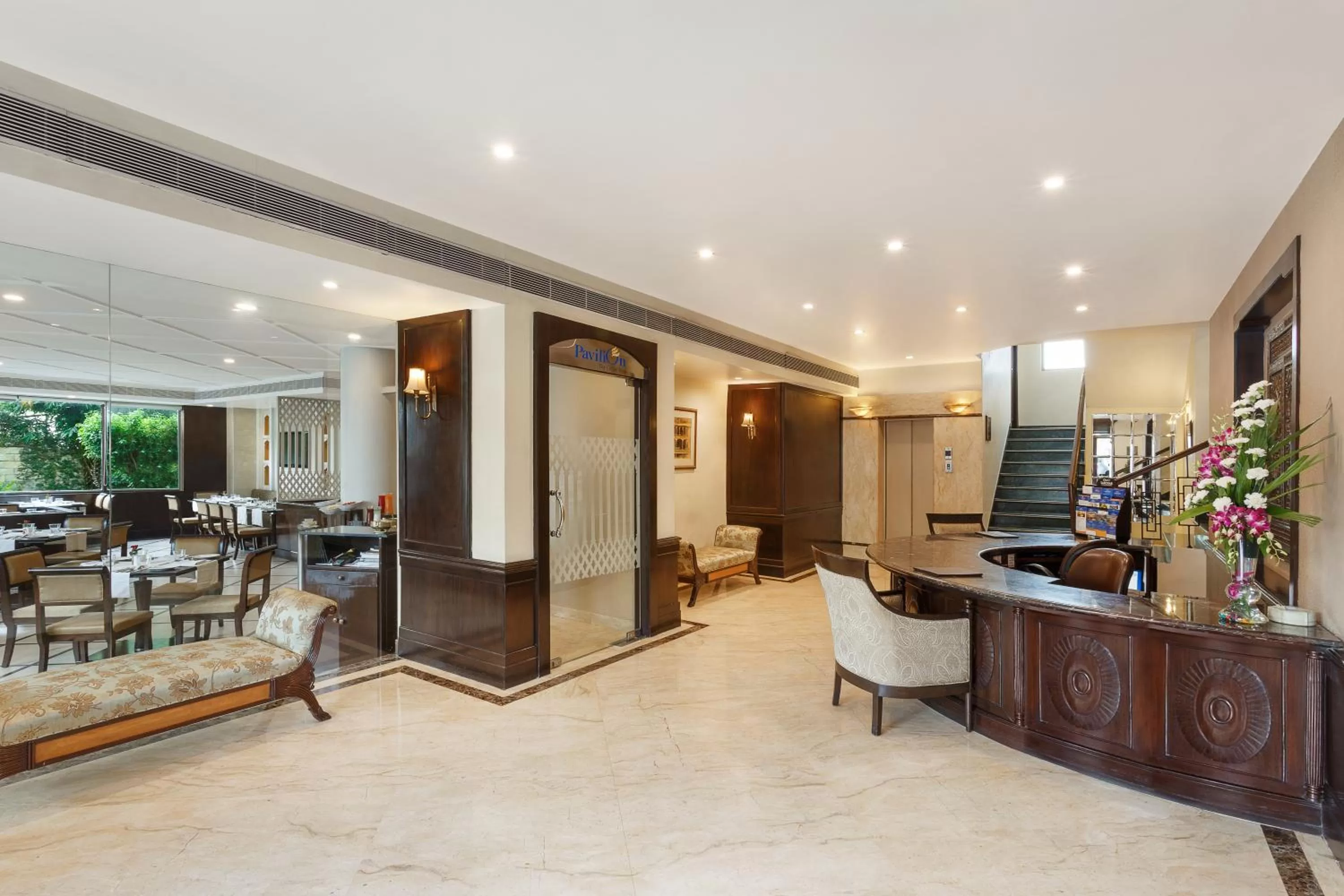 Lobby or reception in La Place Sarovar Portico