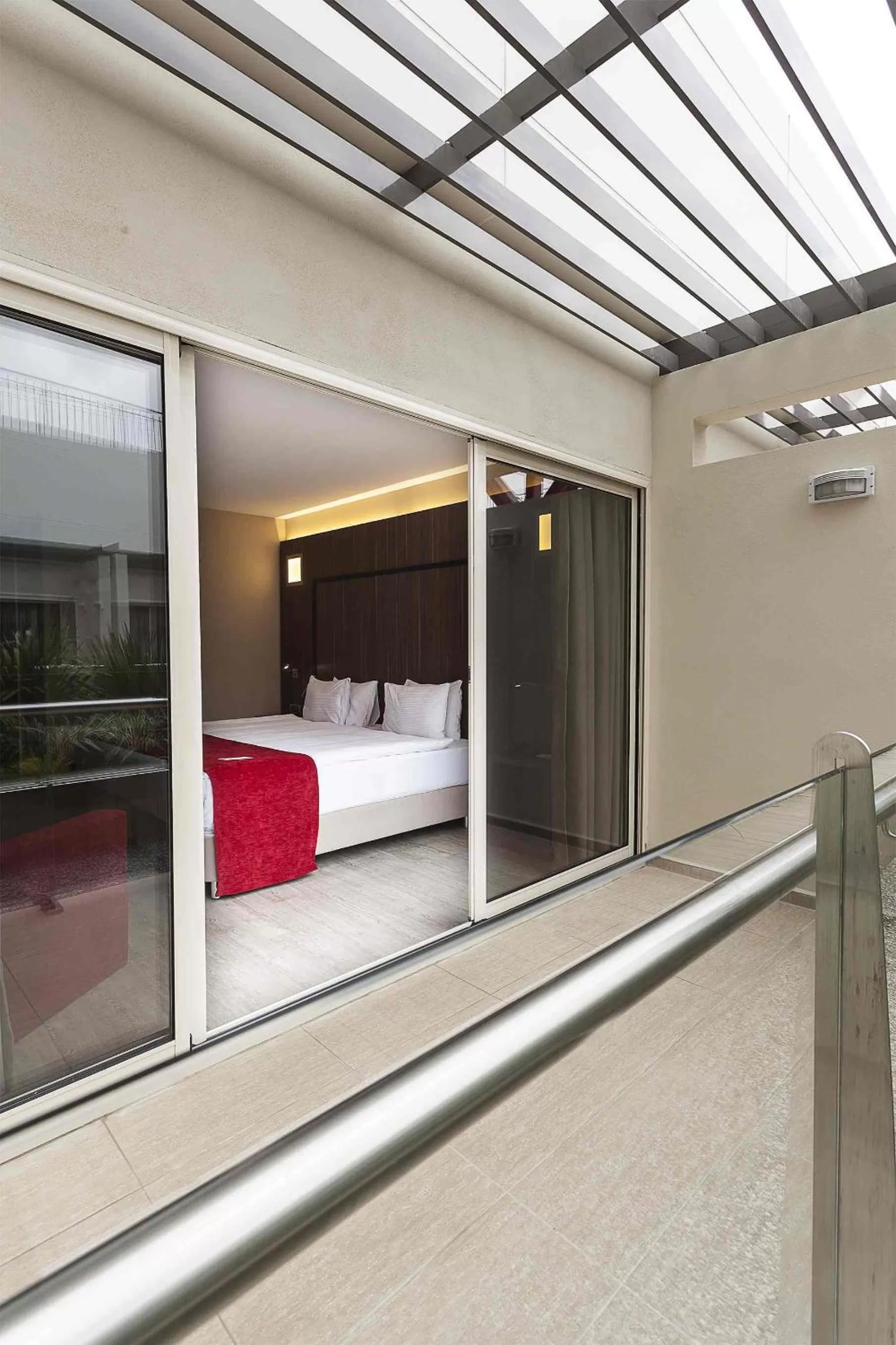 Balcony/Terrace, Bed in Ramada Encore by Wyndham Izmir